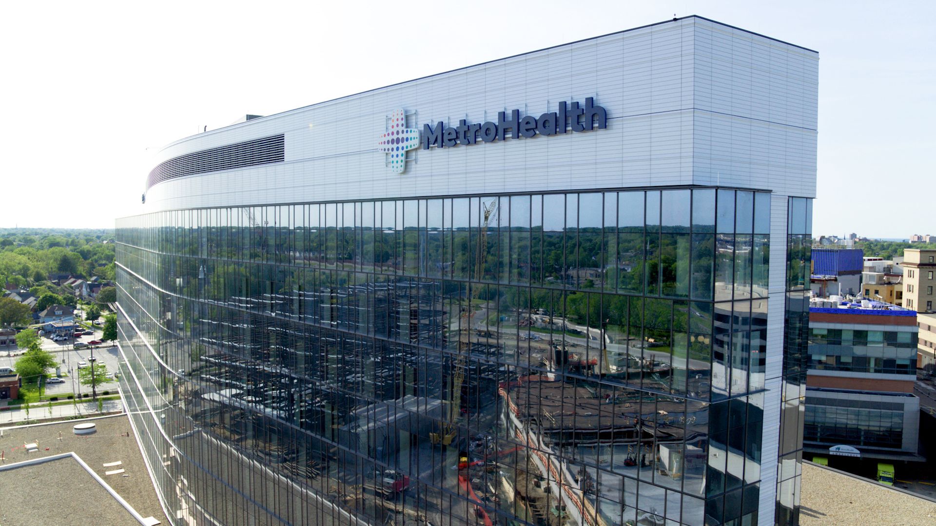 The MetroHealth building in Cleveland, with glass walls and a white top