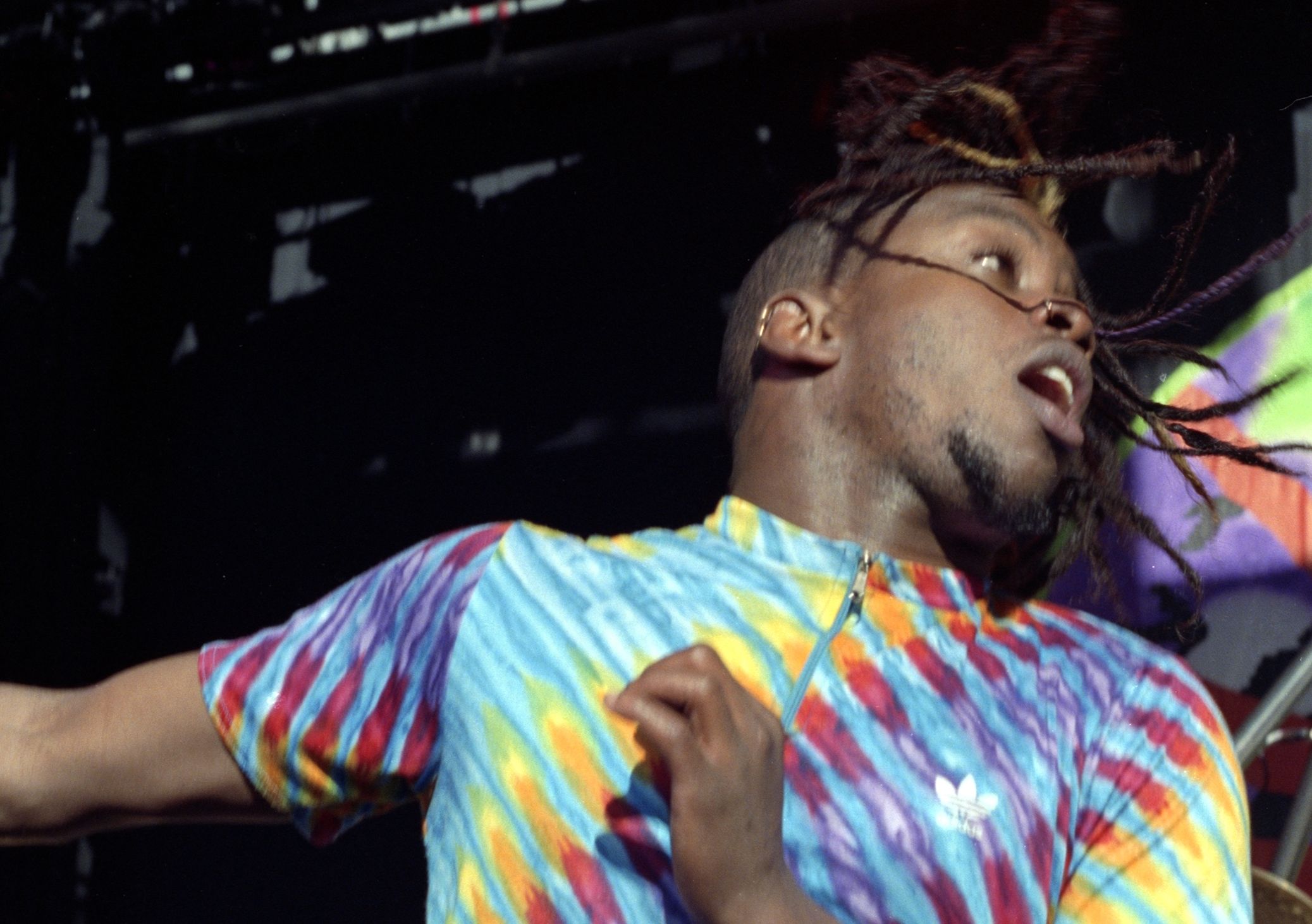 The lead singe of Living Colour performs on stage. 