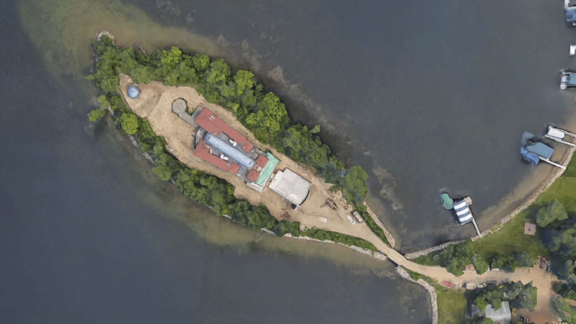 An aerial image of the home on an island 