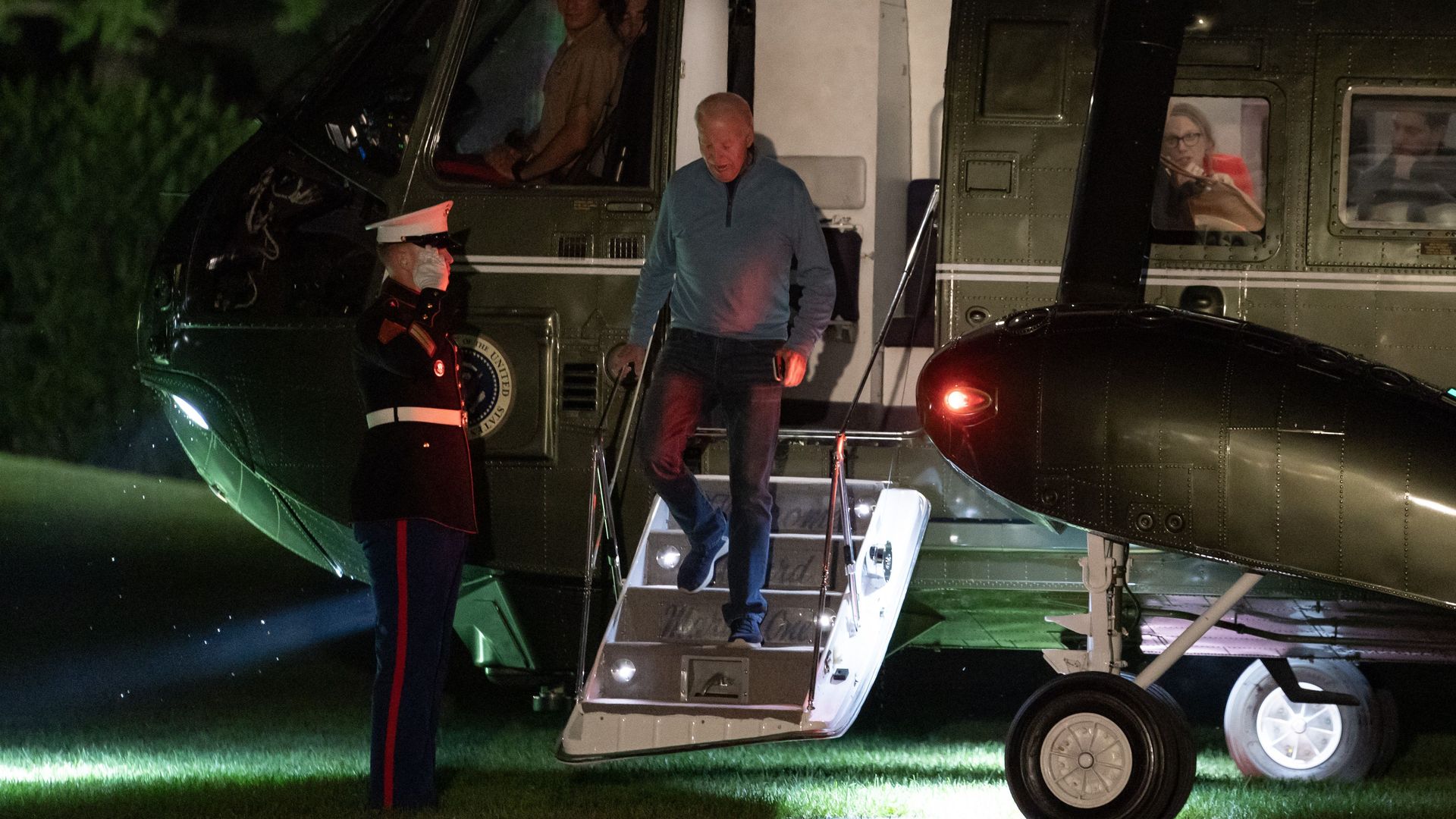 President Biden arrives on the White House South Lawn aboard Marine One early Tuesday after visiting India and Vietnam.