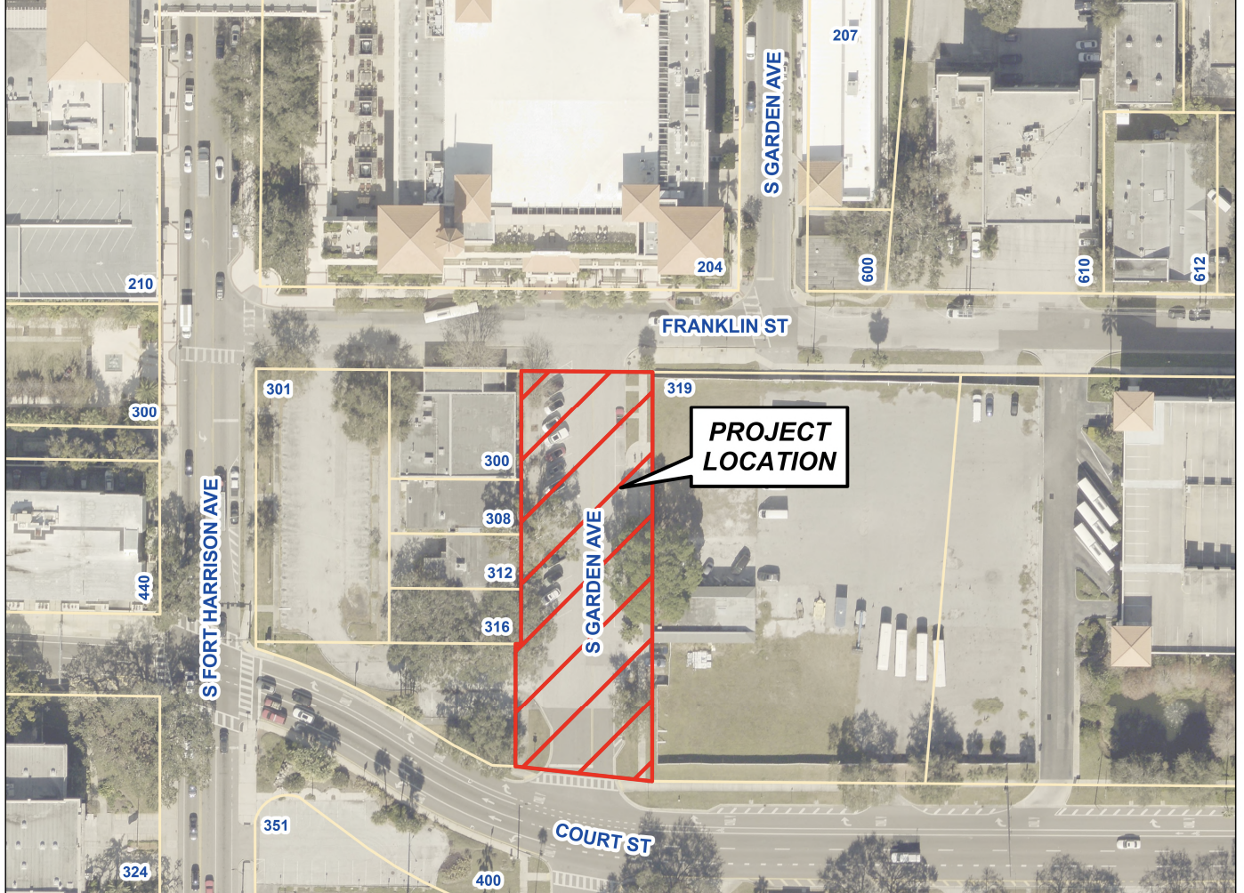 Aerial map showing a vertical red diagonal-striped project site on S Garden Ave between Court St and Franklin St, with a white speech bubble reading "PROJECT LOCATION".
