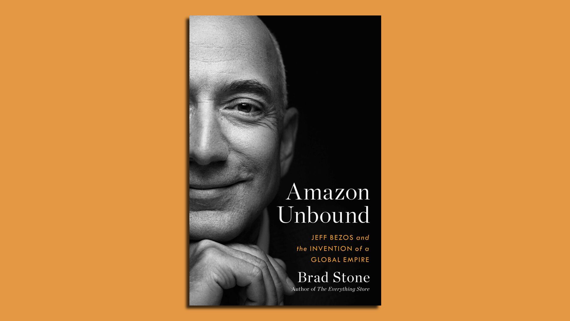cover of the book "Amazon Unbound" by Brad Stone, featuring a black and white picture of the left half of Amazon CEO Jeff Bezos face