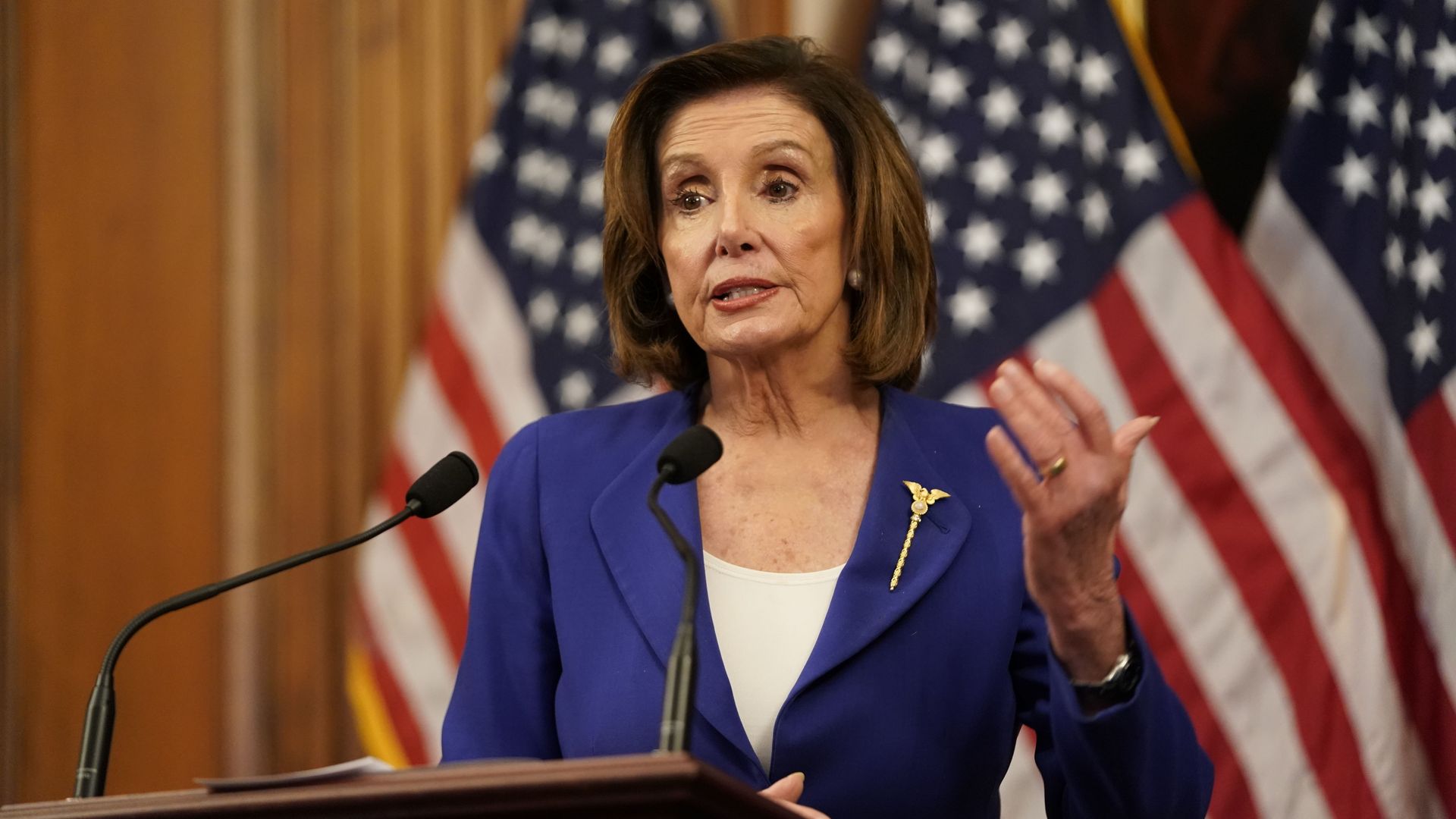 Speaker of the House Nancy Pelosi speaks to the press after the House passed a $2 trillion stimulus bill