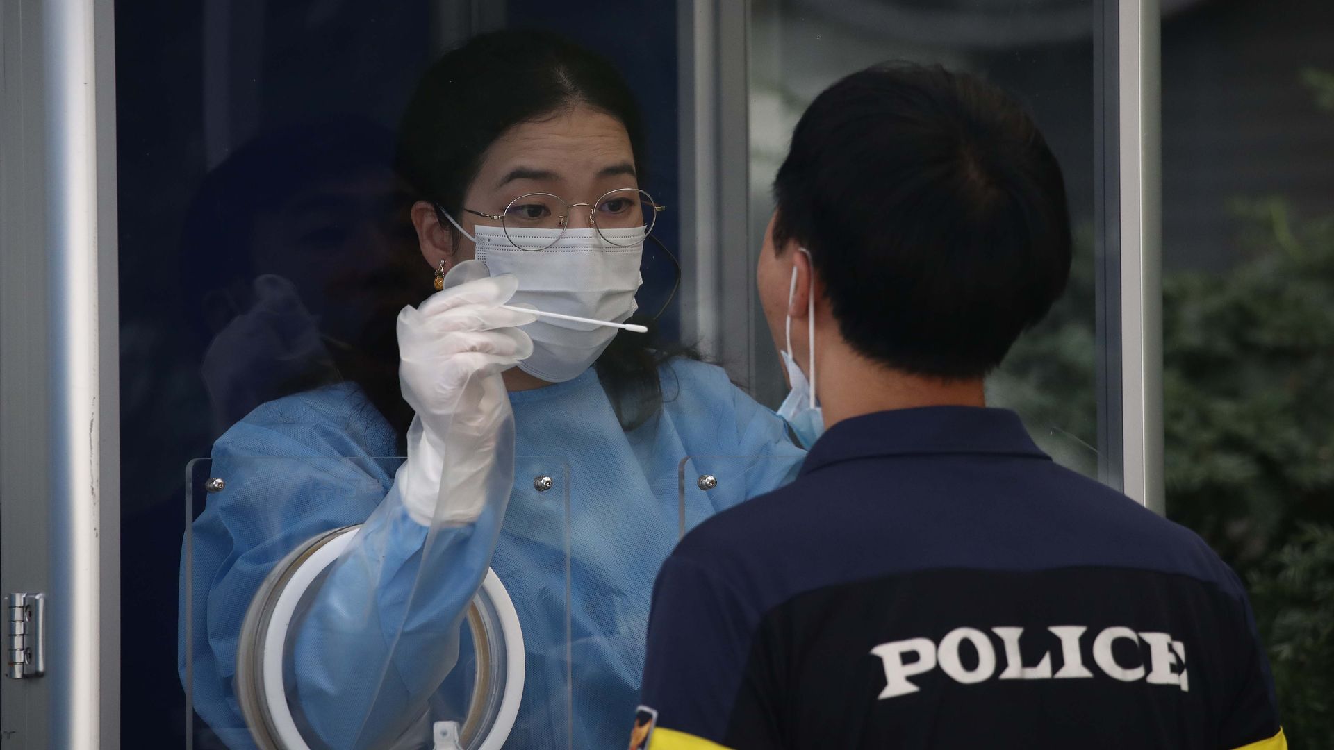A coronavirus test being done in Seoul. Photo: Chung Sung-Jun/Getty Images