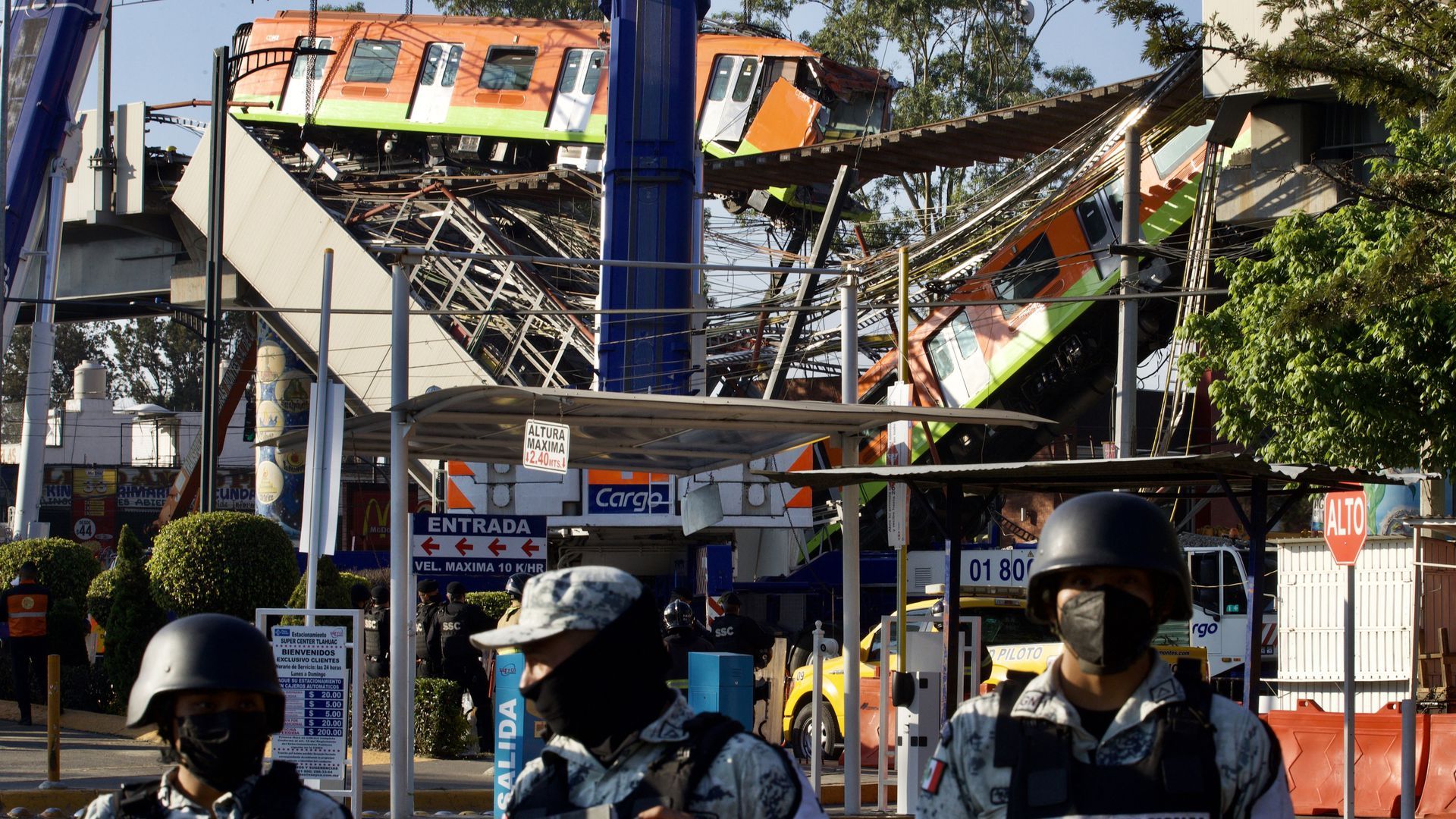 Photo of a metro overpass that collapsed onto the highway