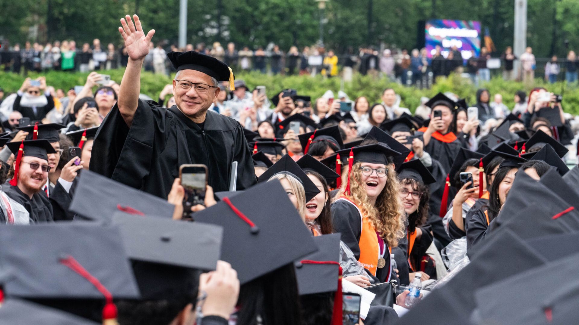 Nvidia CEO Jensen Huang greets graduates today at Carnegie Mellon University in Pittsburgh. 