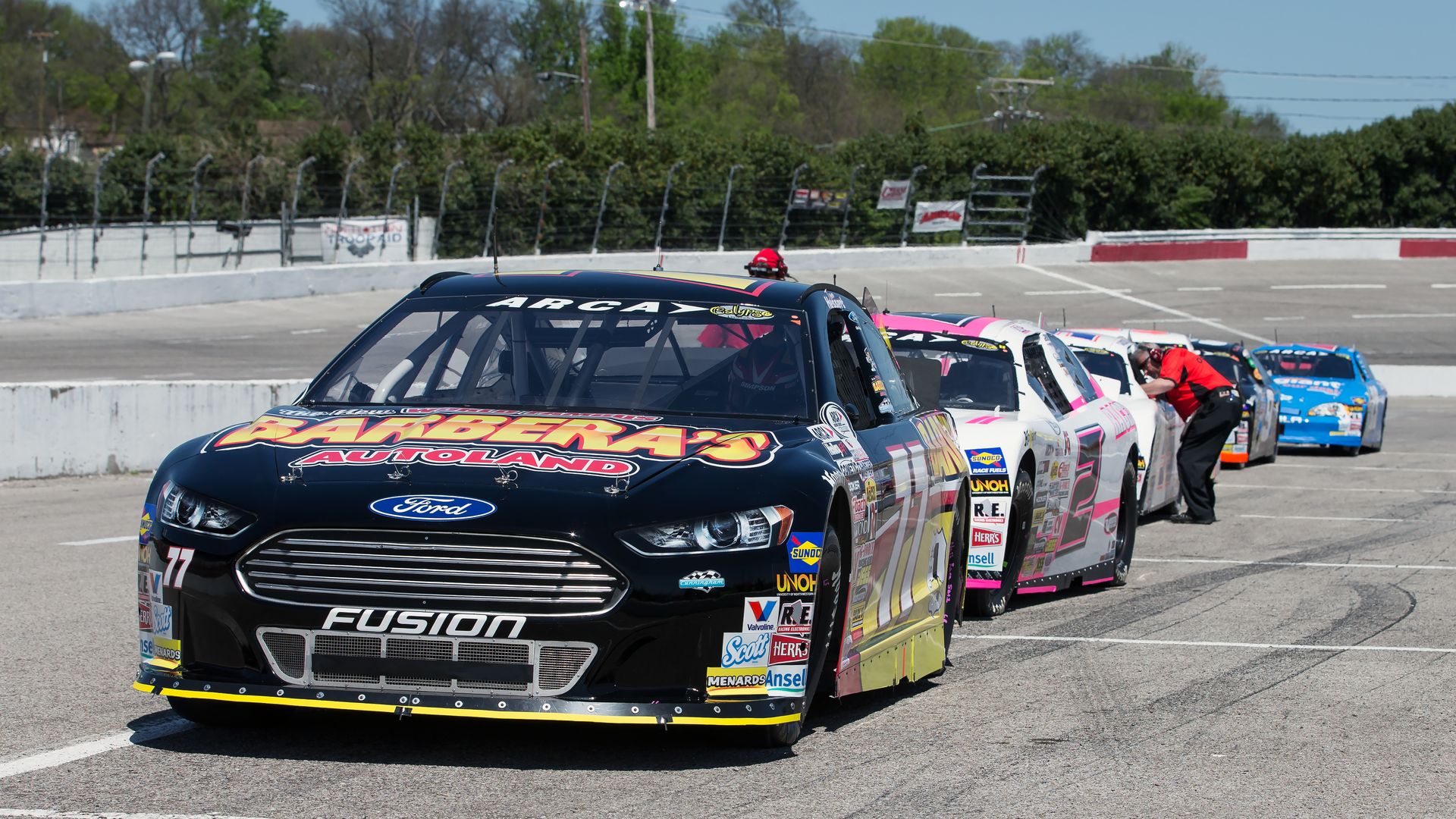 ARCAR cars prepare to race at the fairgrounds speedway in 2015. 