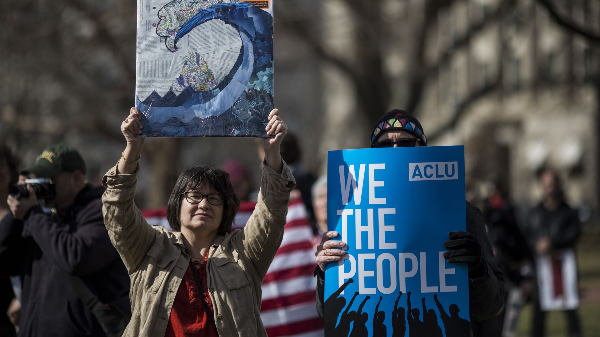 Demonstrators gather in Lafayette Square during a demonstration organized by the American Civil Liberties Union (
