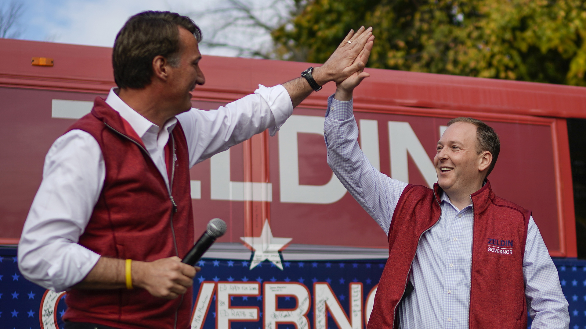 Youngkin in a red vest