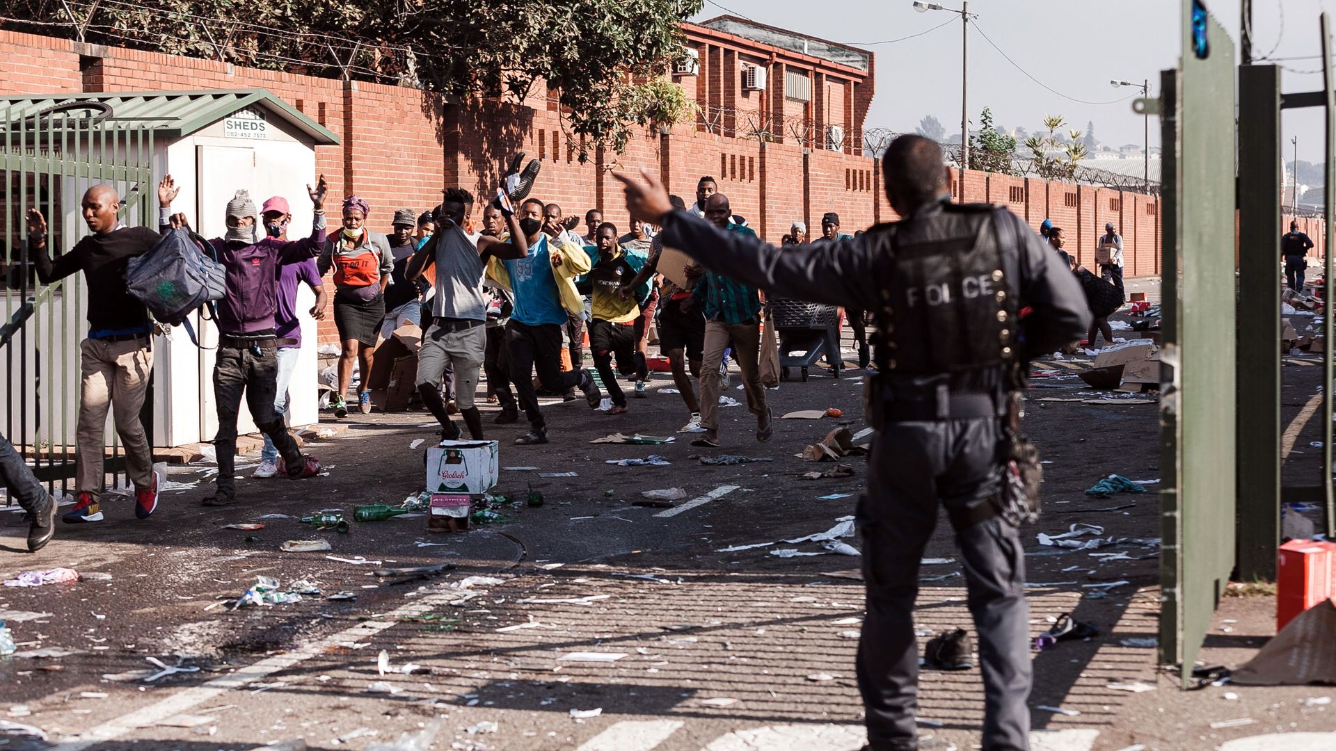 People leaving a shopping mall in Durban, South Africa, on July 12.