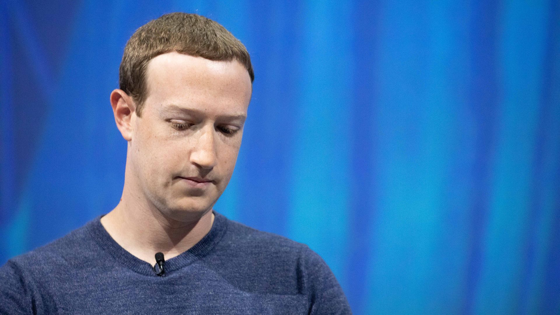 Mark Zuckerberg, eyes cast downward