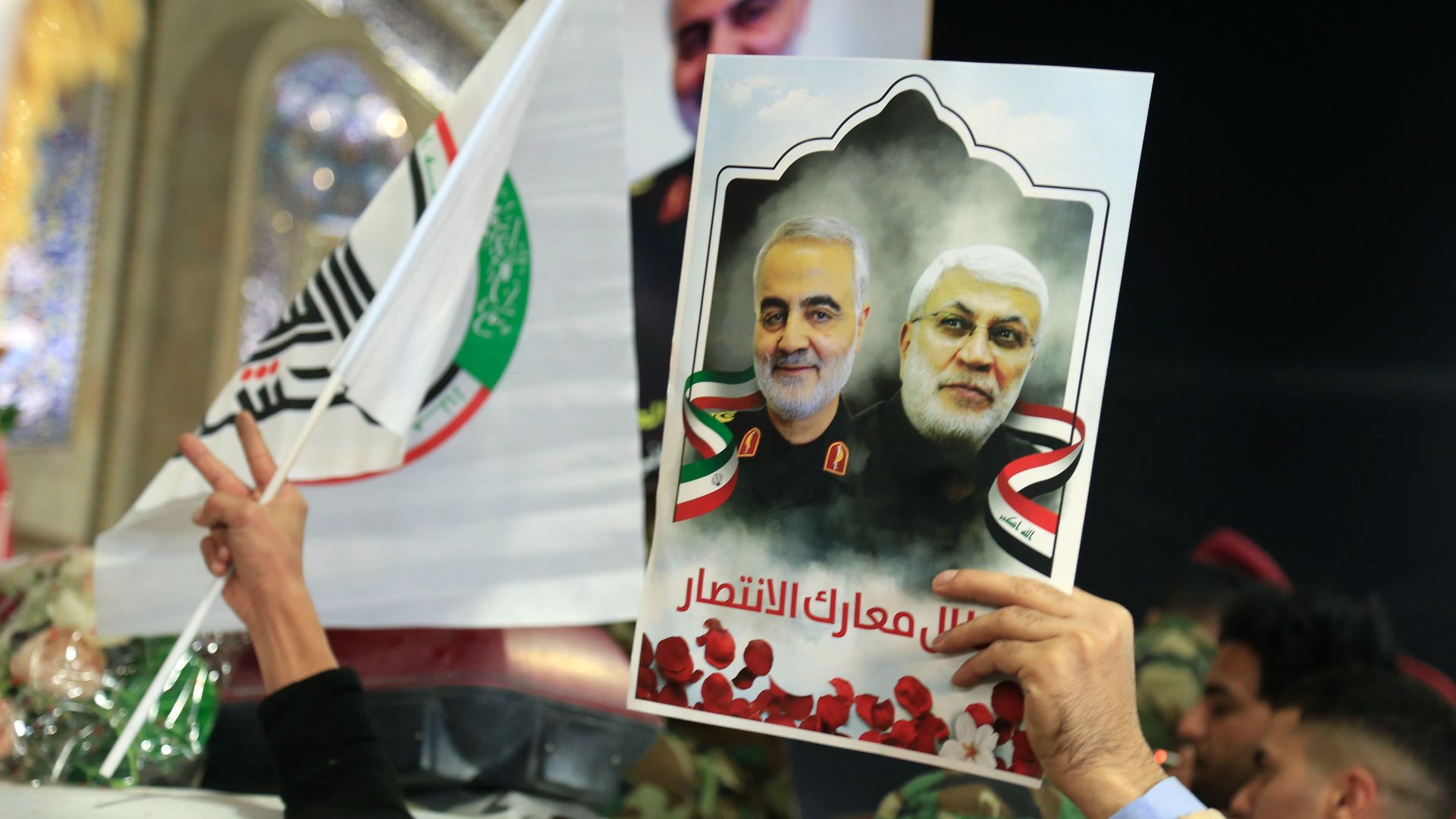 Mourners take part in the funeral procession of slain Iranian General Qasem Soleimani