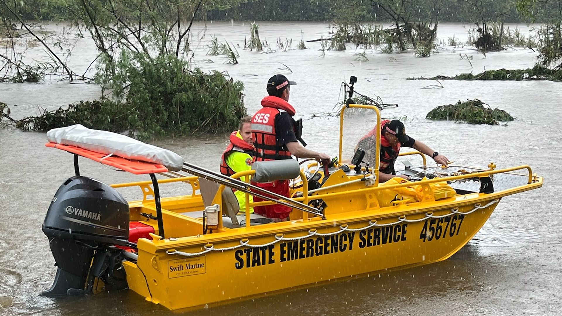 Queensland State Emergency Service volunteers respond to flooding in the state's northeast from ex-Tropical Cyclone Jasper on Sunday.