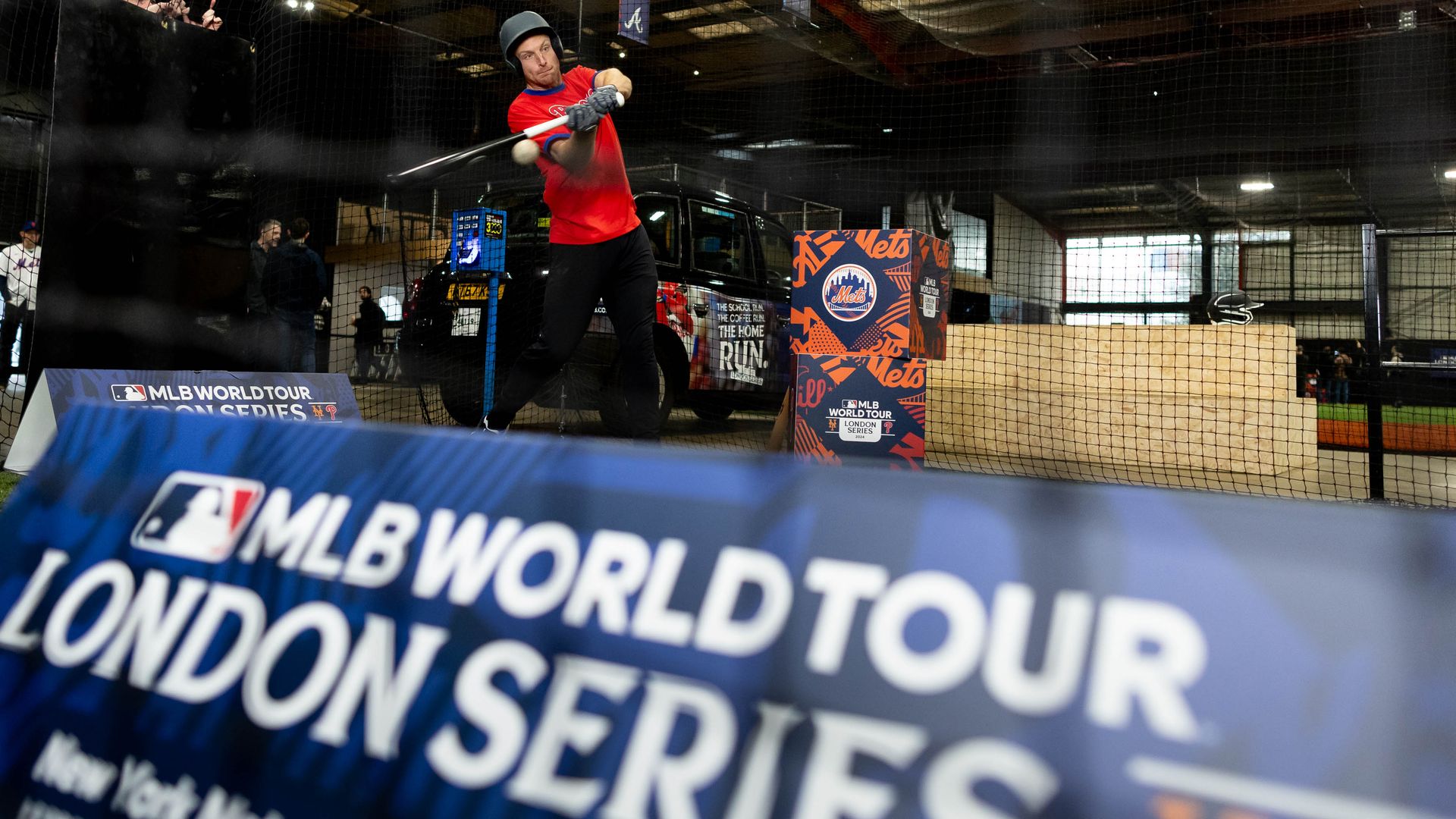 England cricketer Jos Buttler takes part in a baseball masterclass with MLB Legend Chase Utley.