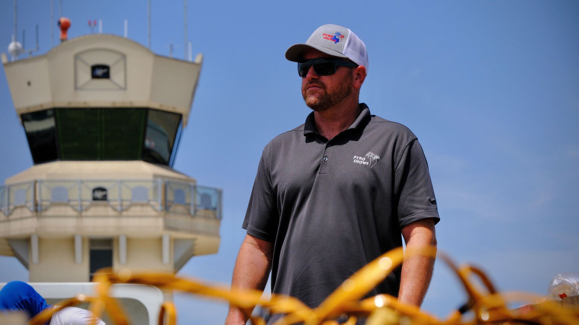 The man who overseas preparing for the Kaboom Town fireworks show watches over installation