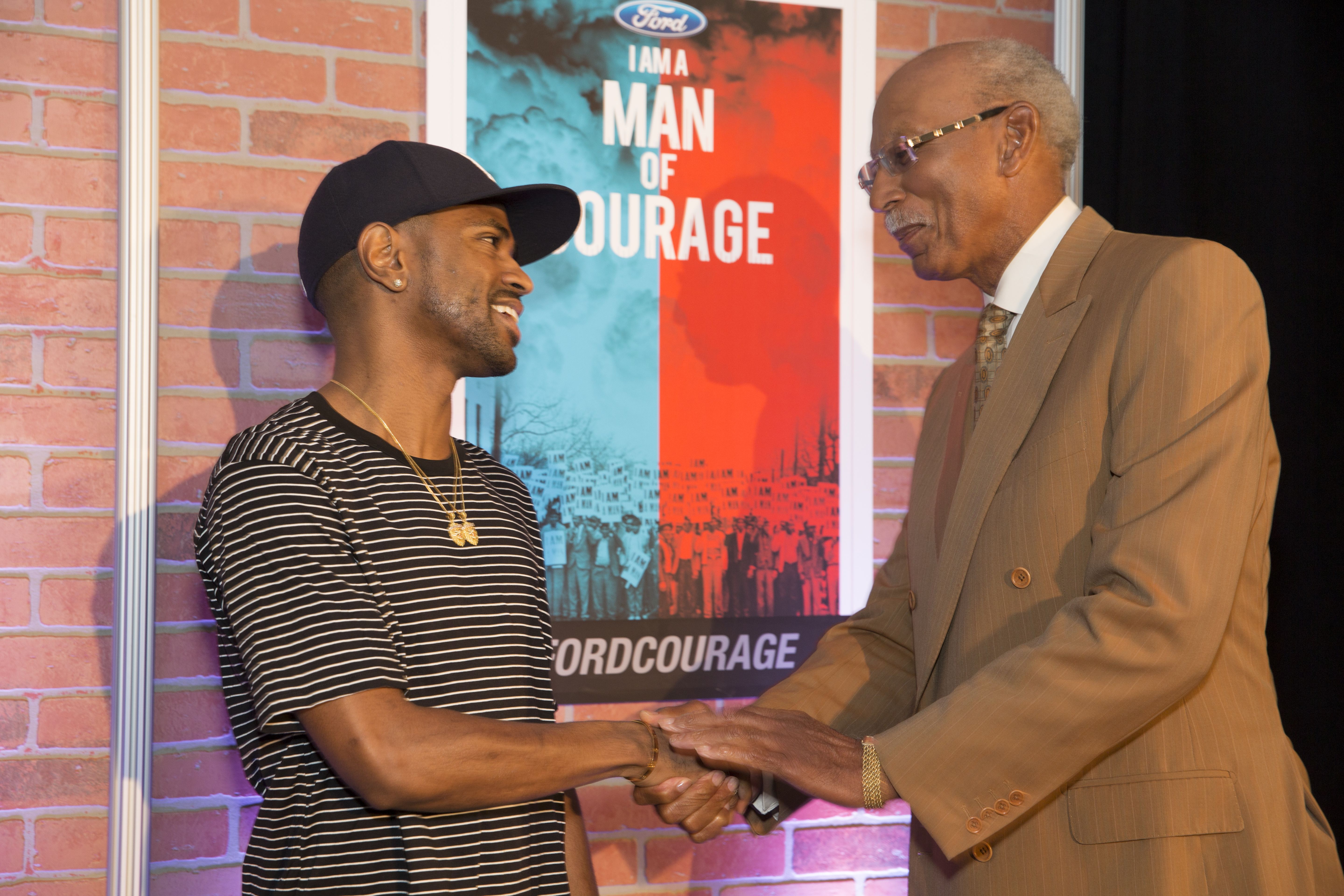 Big Sean and Former Detroit Mayor Dave Bing attends Men of Courage at Charles H. Wright Museum of African American History on August 20, 2015 in Detroit, Michigan