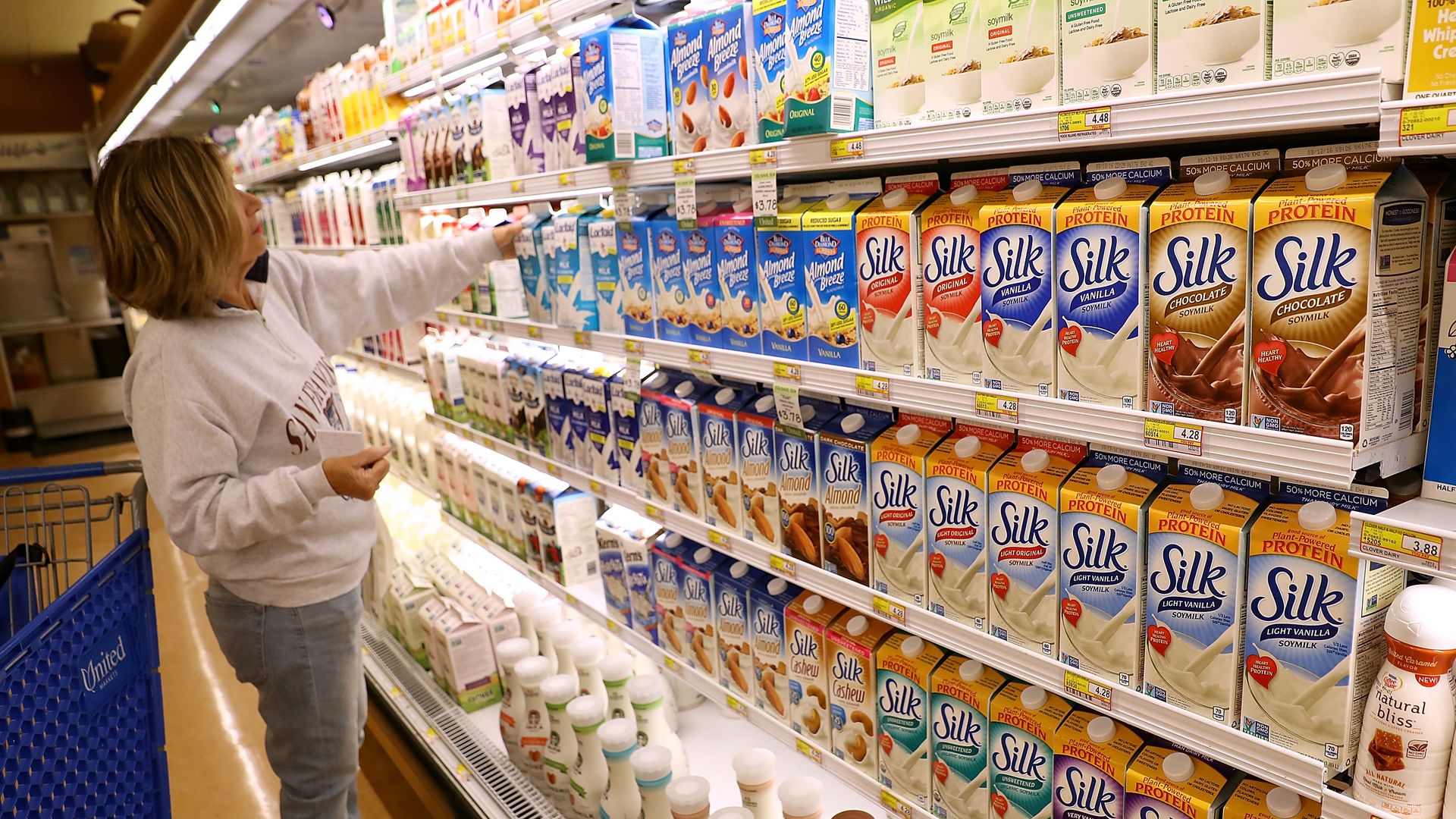 Containers of Silk soy mik are displayed on a shelf at United Market on July 7, 2016 in San Rafael, California.