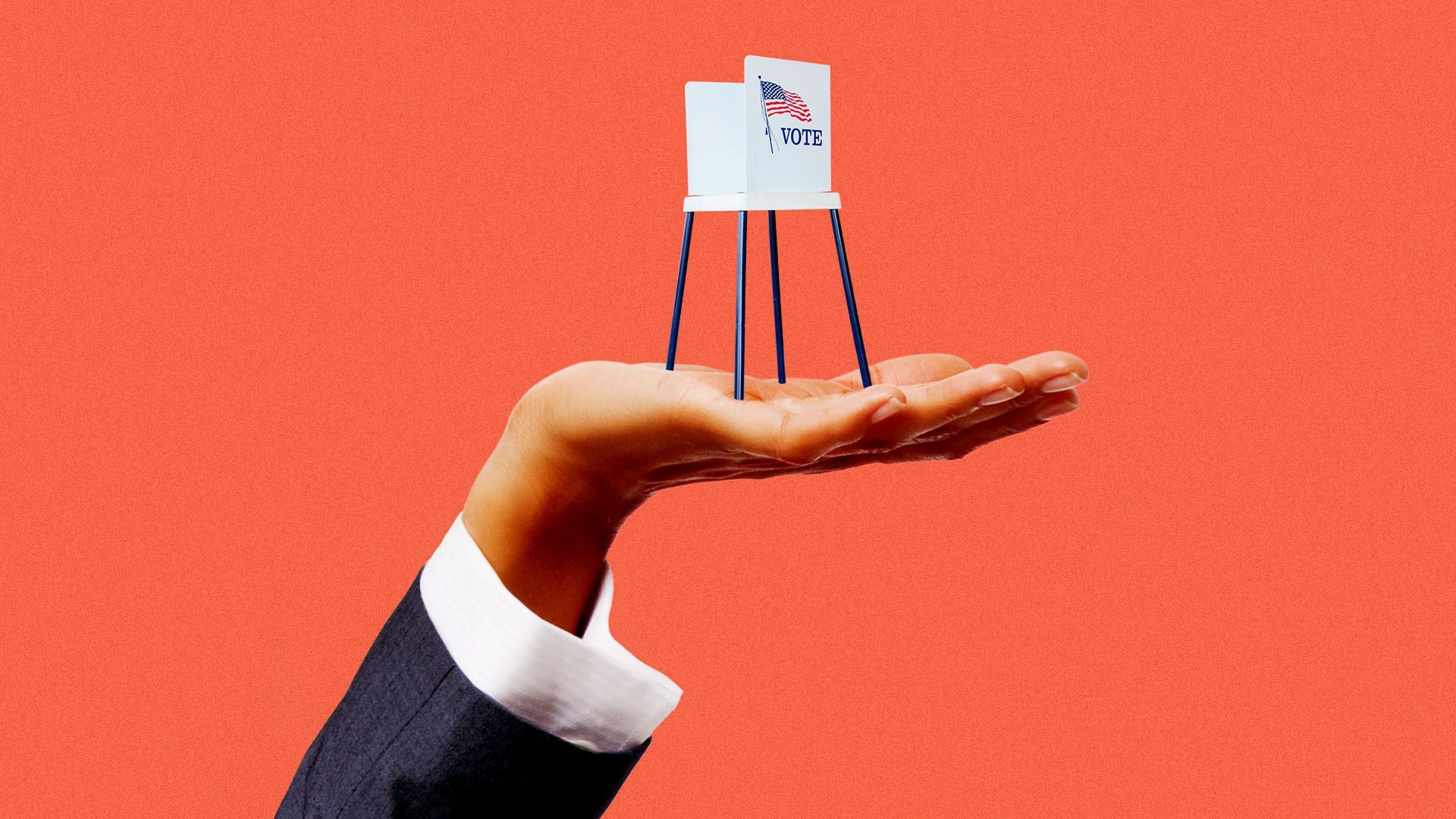 Hand holding up voting booth