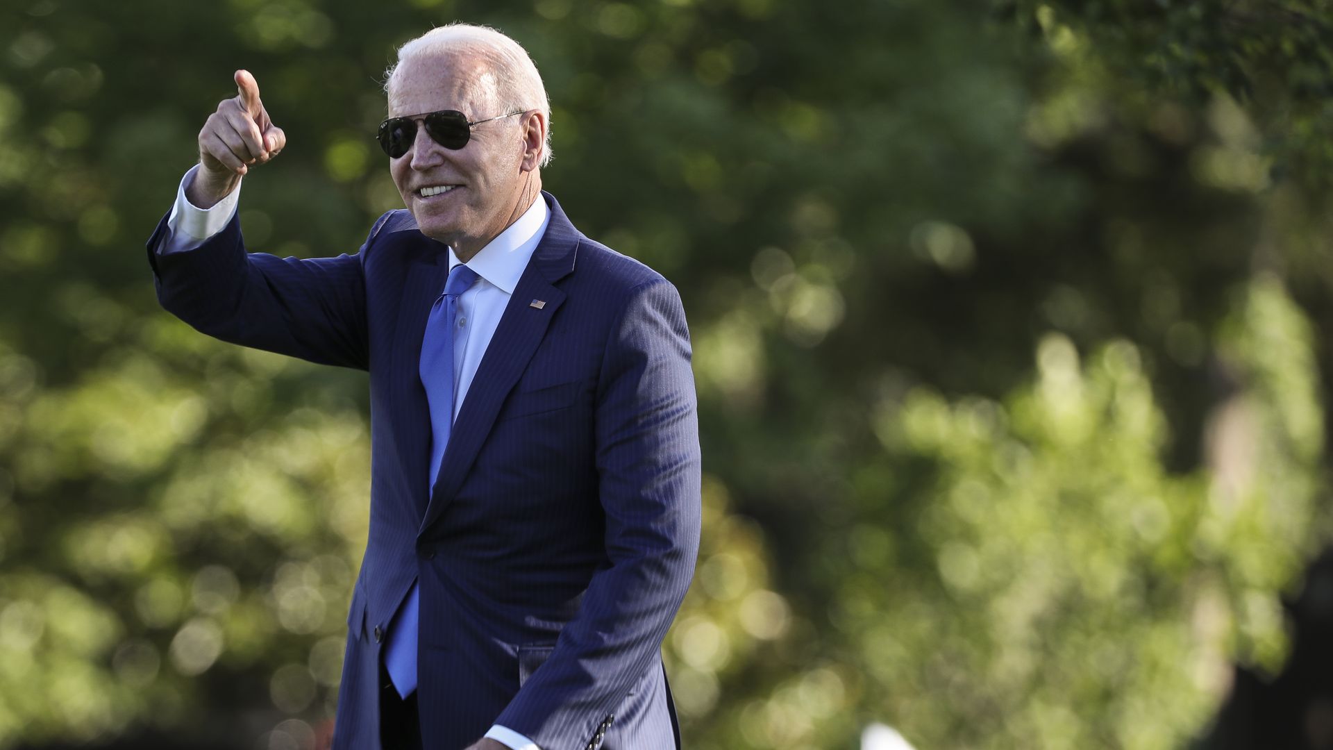 President Joe Biden gestures while walking on the South Lawn of the White House before boarding Marine One in Washington, D.C., U.S., on Friday, June 25, 2021.