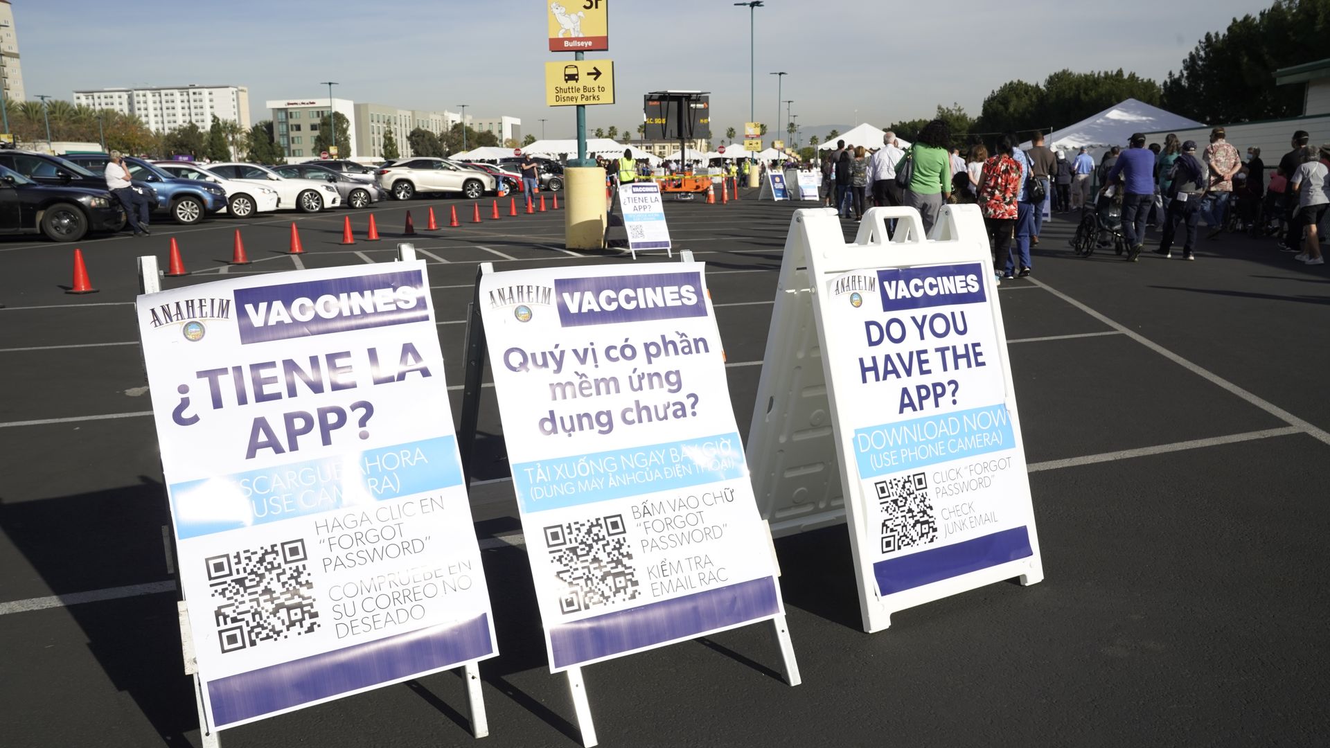 English, Spanish, and Vietnamese-language signage at a Covid-19 vaccination site at Disneyland