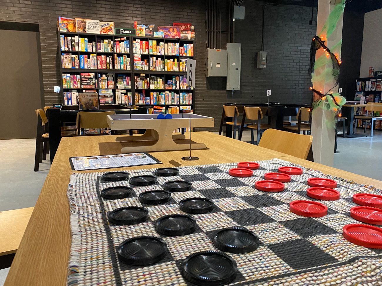 inside game room with a checkers set up