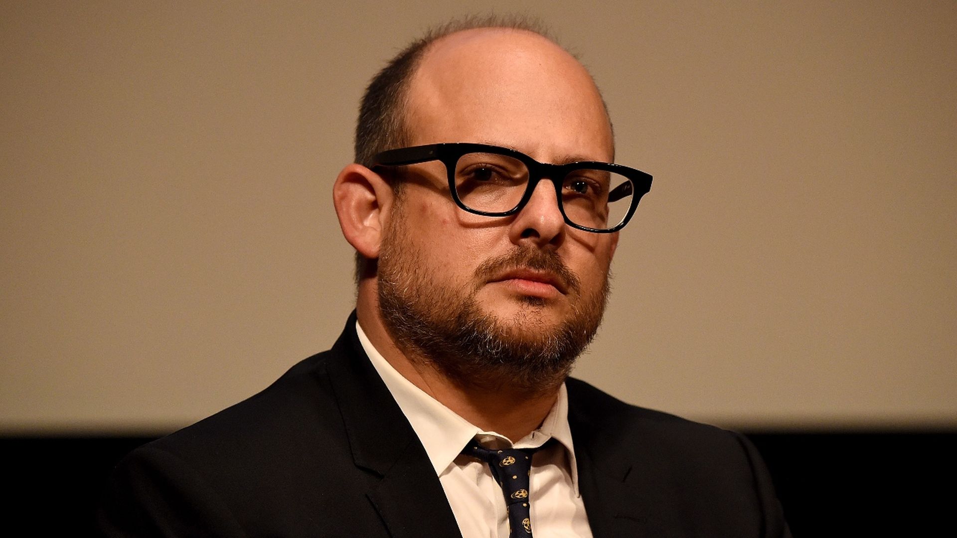 A photo of Industrial Media founder Eli Holzman by himself wearing glasses