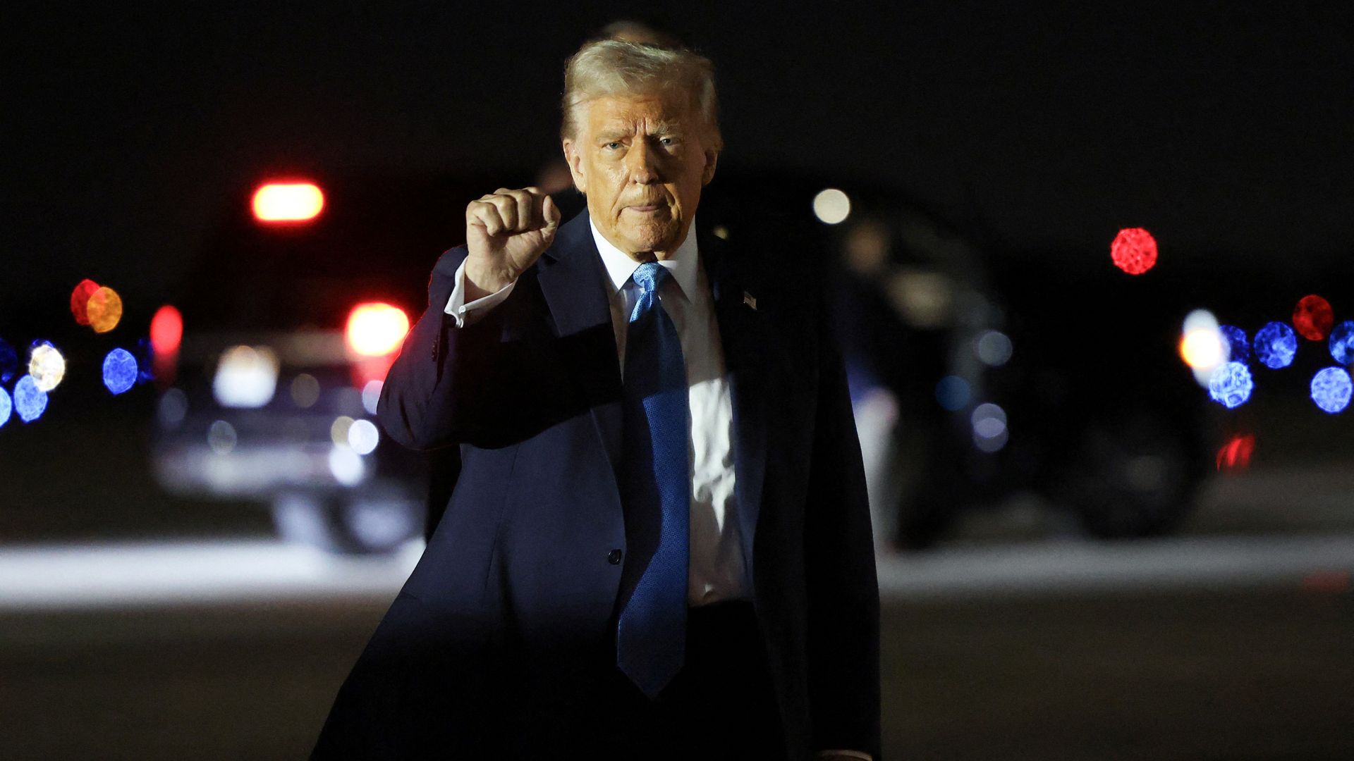 U.S. President Donald Trump pumps his fist upon his arrival in West Palm Beach, Florida, U.S., January 31, 2025. REUTERS/Kevin Lamarque