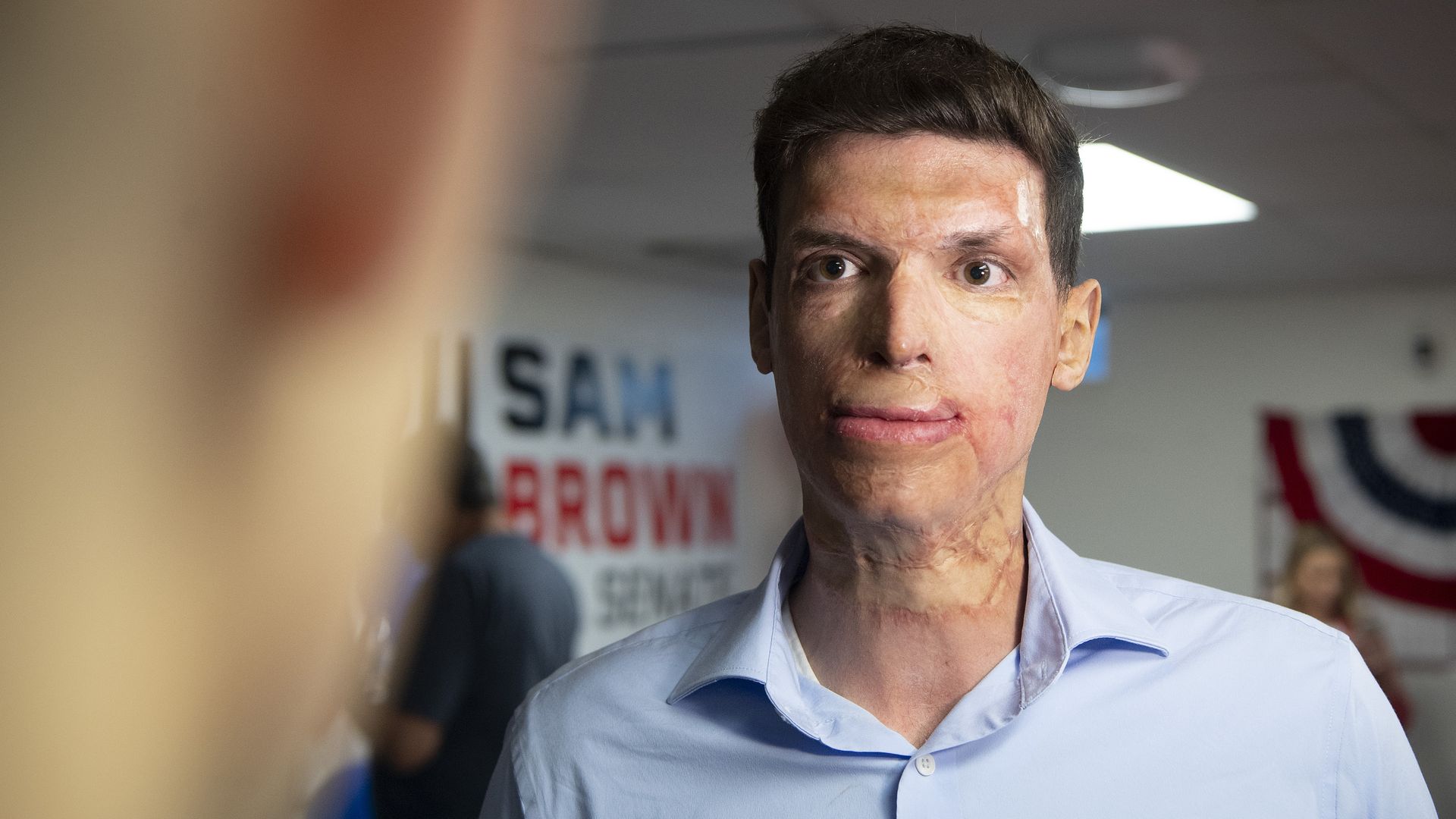 Republican U.S. Senate candidate Sam Brown talks to the media while waiting for election results at his campaign office on June 14, 2022 in Reno, Nevada.
