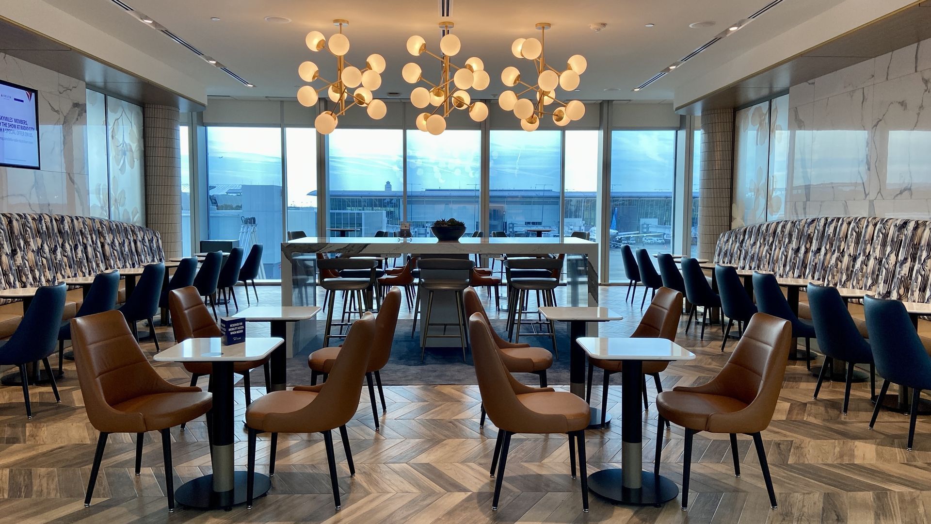 Delta Sky Club, which opened at CLT in December 2024, is the first lounge to open at the airport since 2022. Photo: Ashley Mahoney/Axios