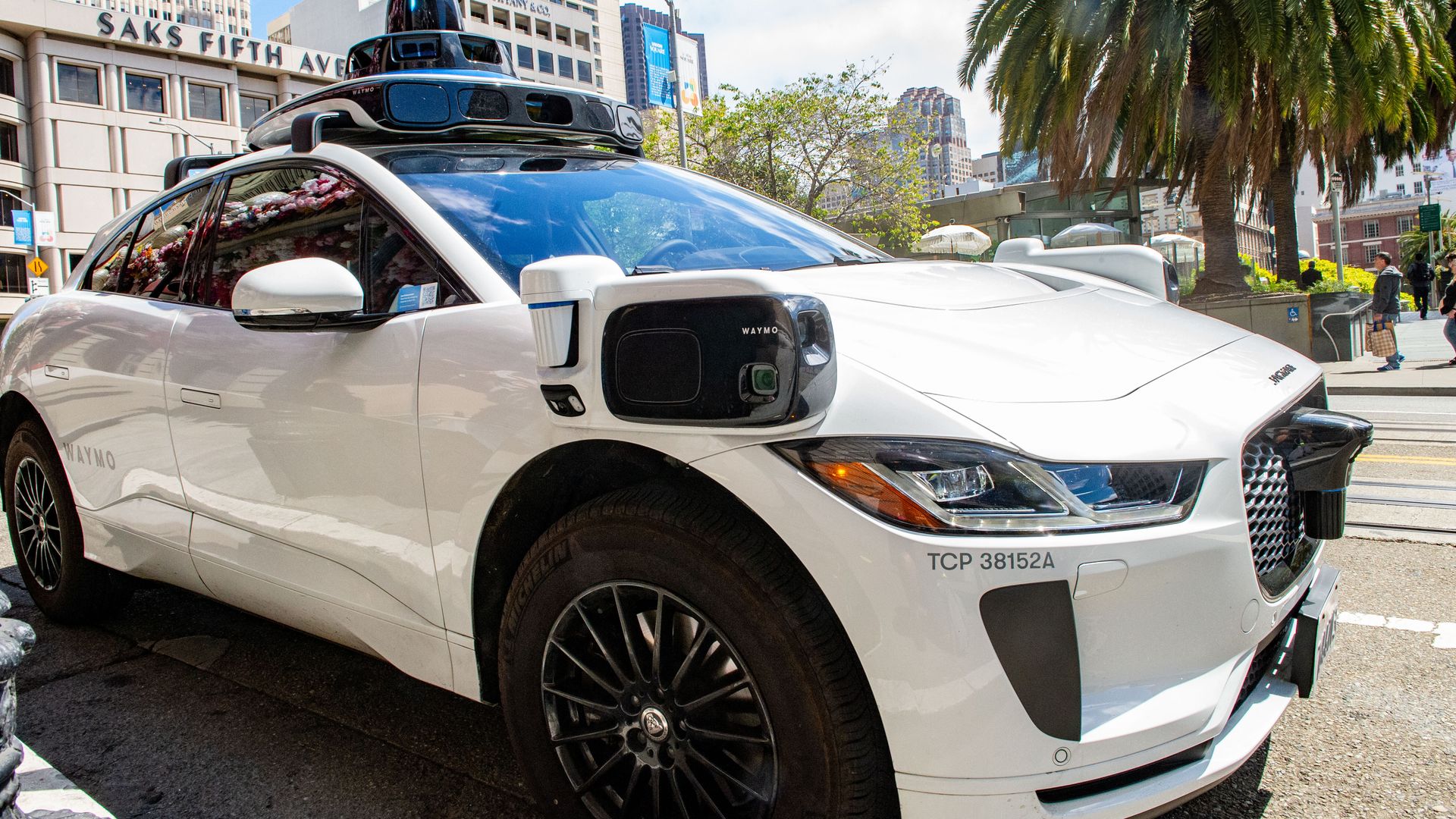 A photo of a Waymo car with cameras and sensors