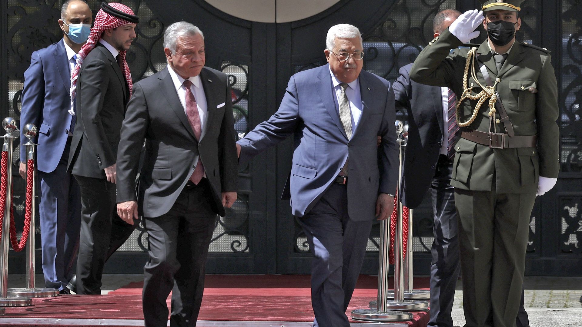 Palestinian President Mahmud Abbas welcomes King Abdullah II of Jordan ahead of a meeting in Ramallah 