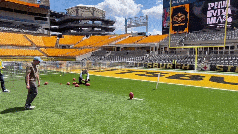 A man kicking a field goal and missing wide left at Acrisure Stadium.