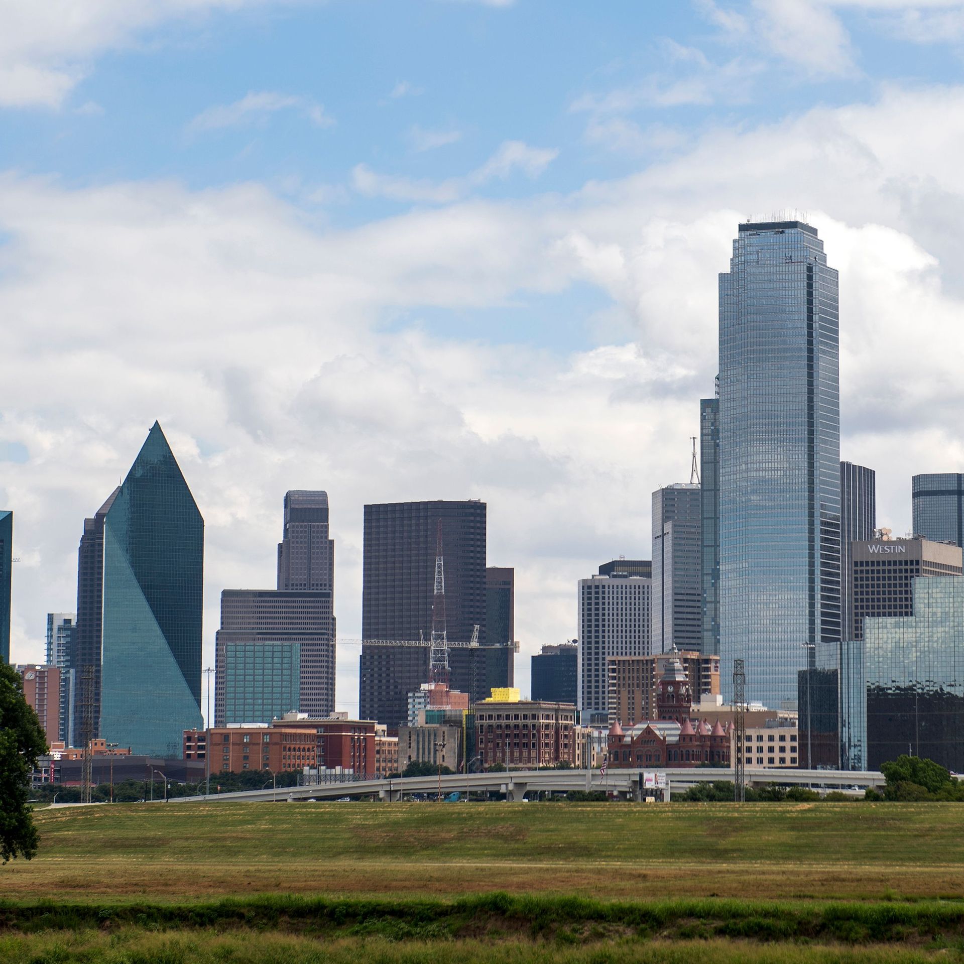Photo of the Dallas skyline on a sunny day