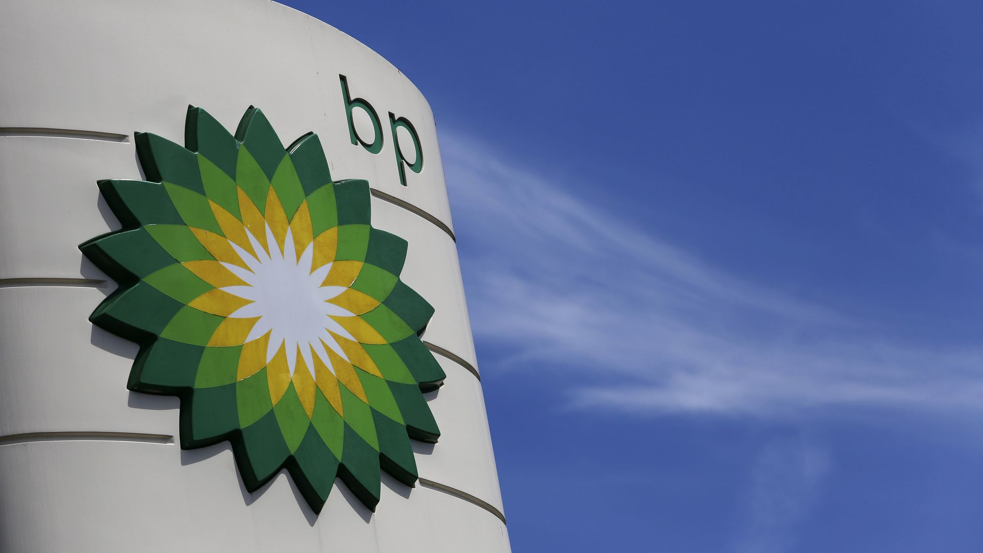 A BP company logo is displayed on the forecourt of a gas station