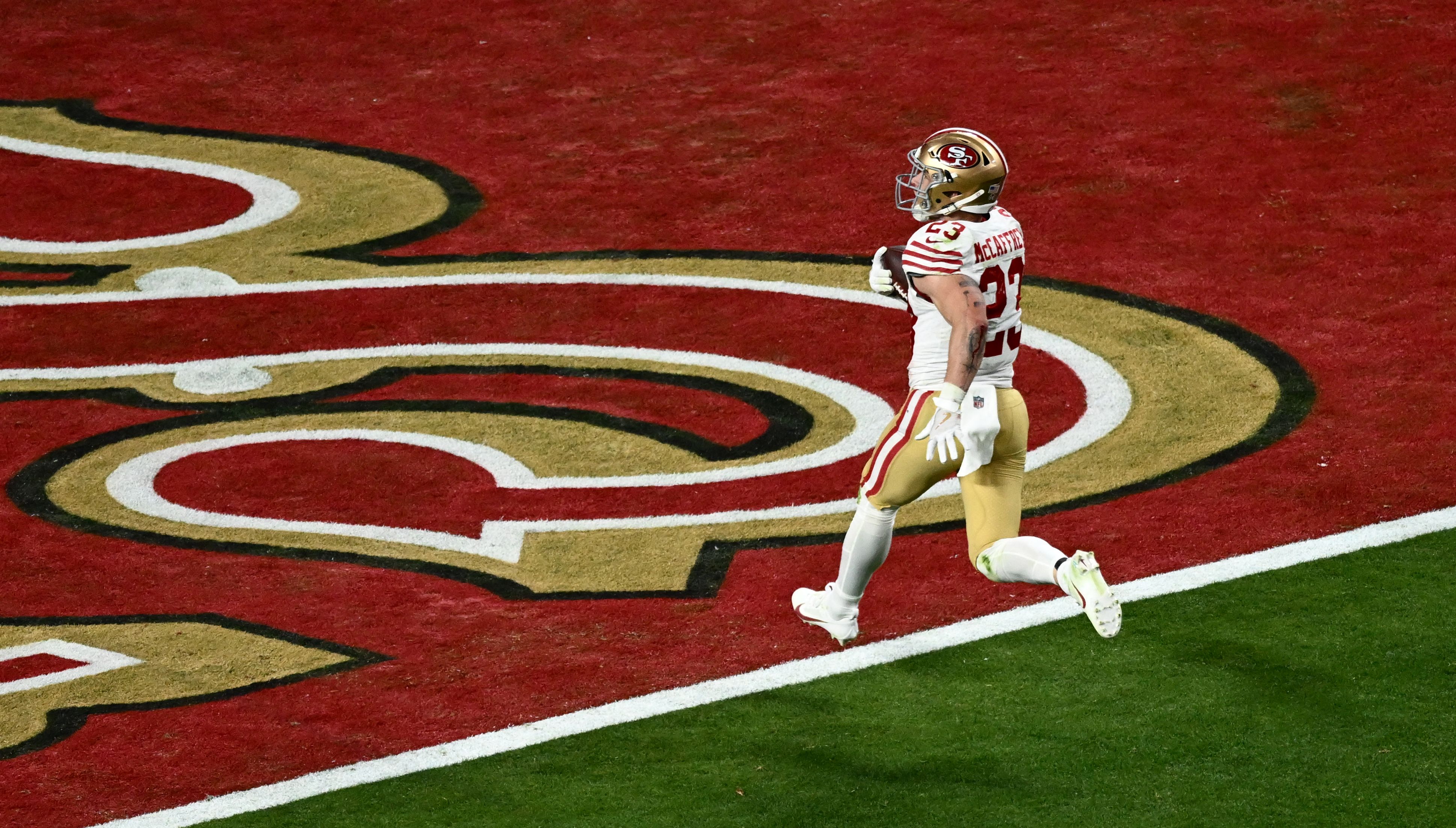  San Francisco 49ers' running back #23 Christian McCaffrey scores a touchdown during Super Bowl LVIII between the Kansas City Chiefs and the San Francisco 49ers at Allegiant Stadium in Las Vegas, Nevada, February 11, 2024.