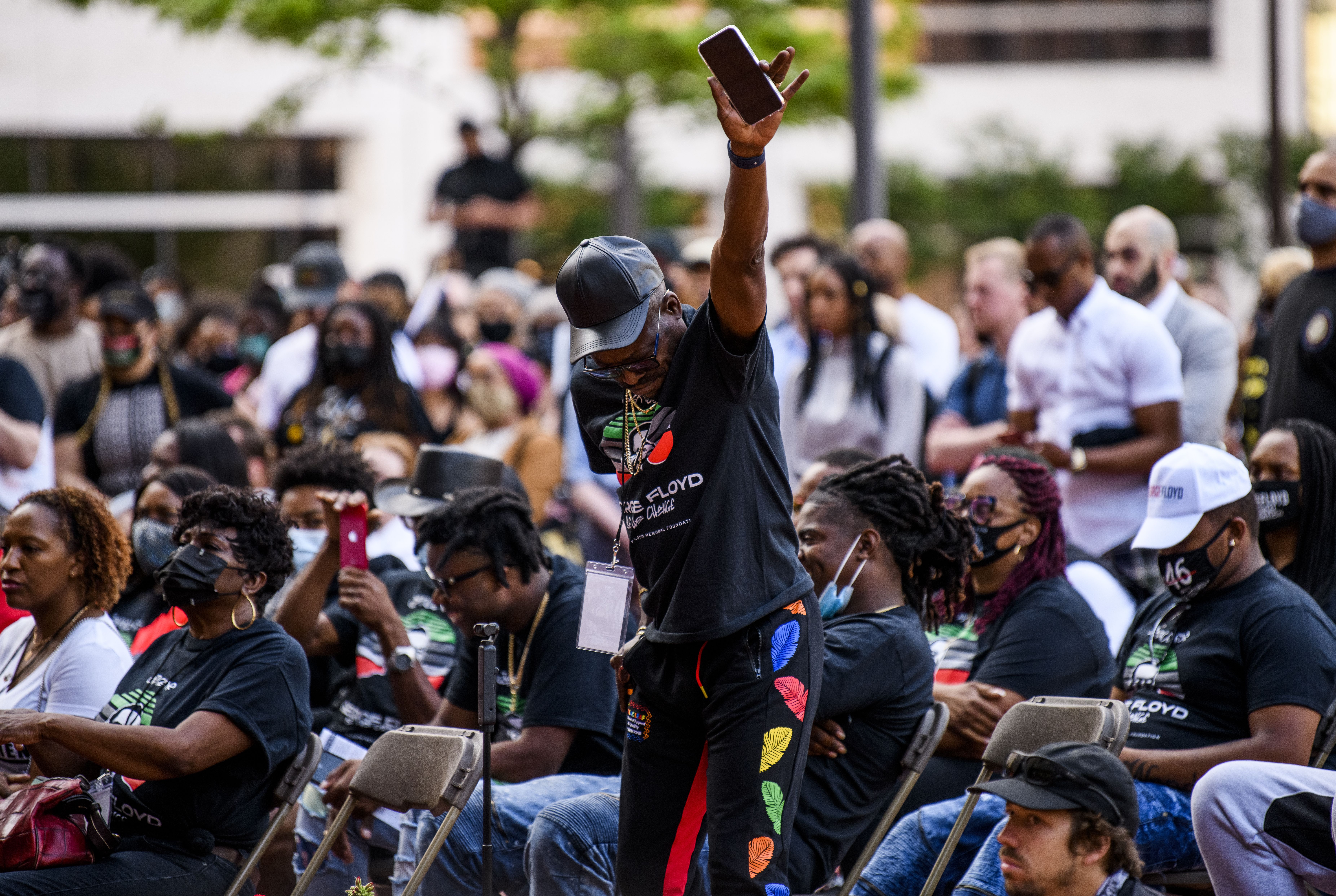  A man reacts as pastor Carmen Means speaks to a group gathered outside the Hennepin County Government Center on May 23, 2021 in Minneapolis, Minnesota.