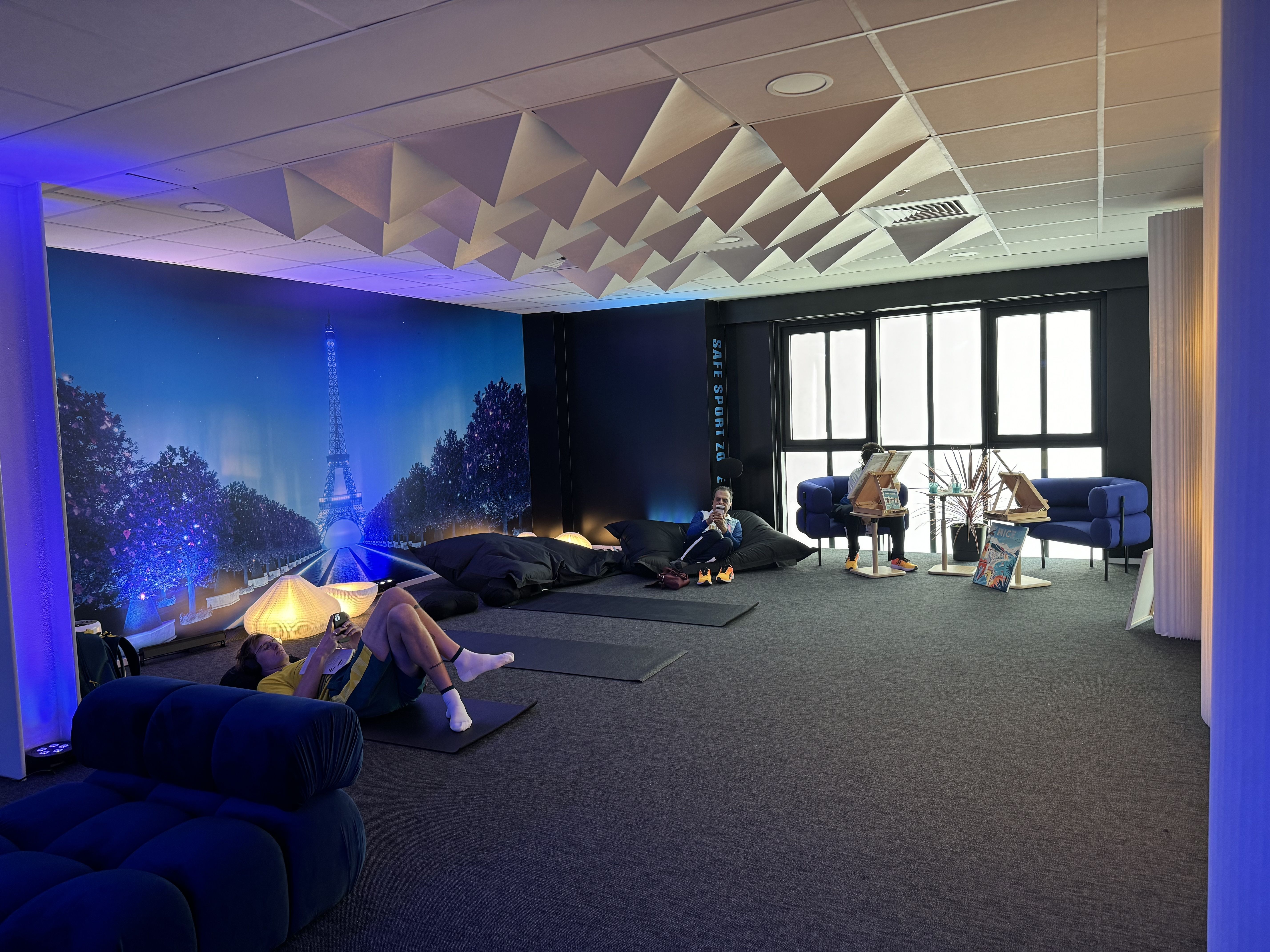 Athletes relax inside the mindfulness zone — one of several new additions to the Olympic Village at the Paris Games.