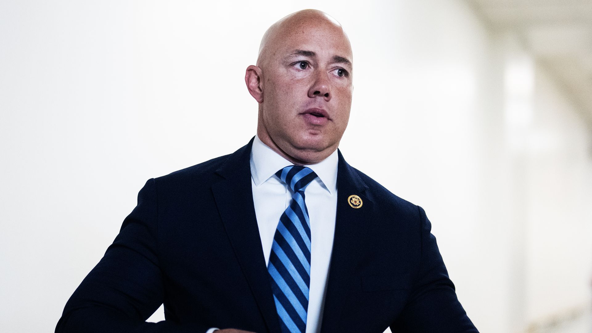  Rep. Brian Mast, R-Fla., leaves a meeting of the House Republican Conference in the U.S. Capitol