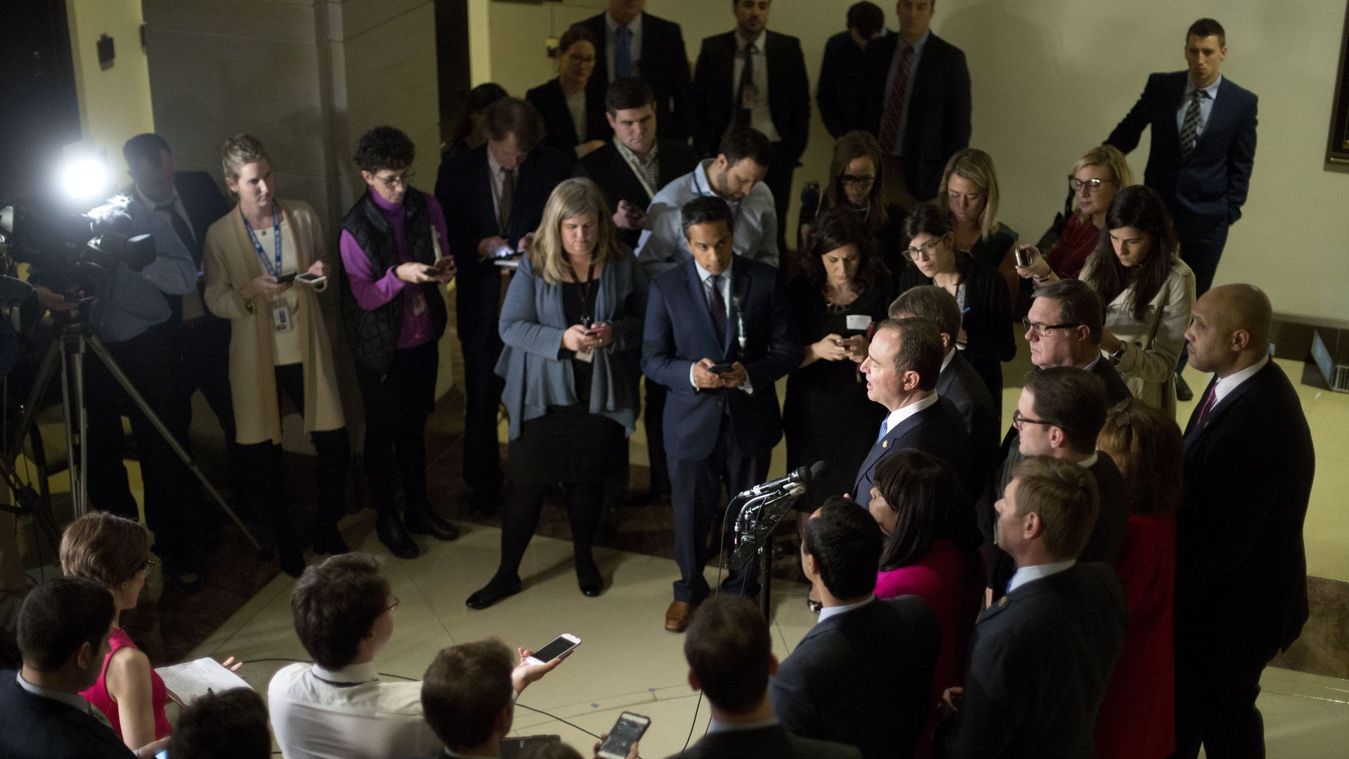 Photo of Rep. Adam Schiff, surrounded by media