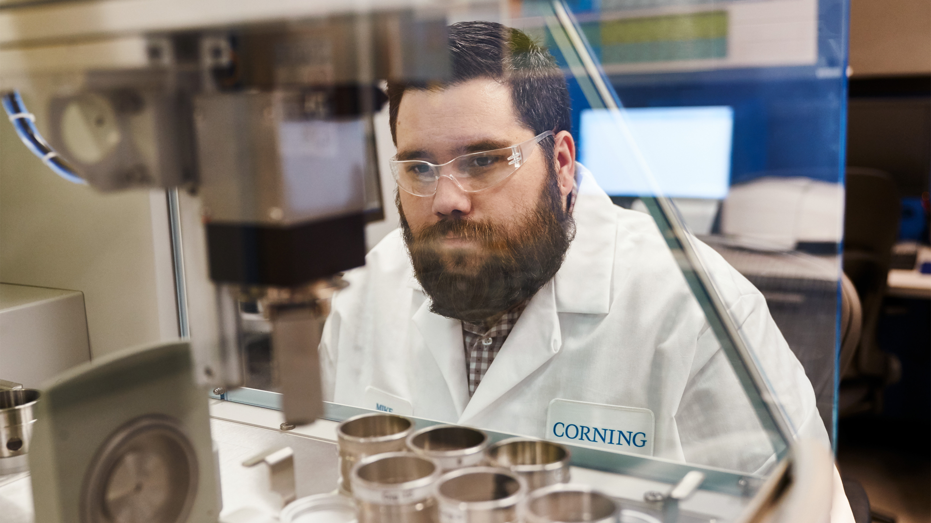 A worker at the Corning plant that makes glass for Apple iPhones