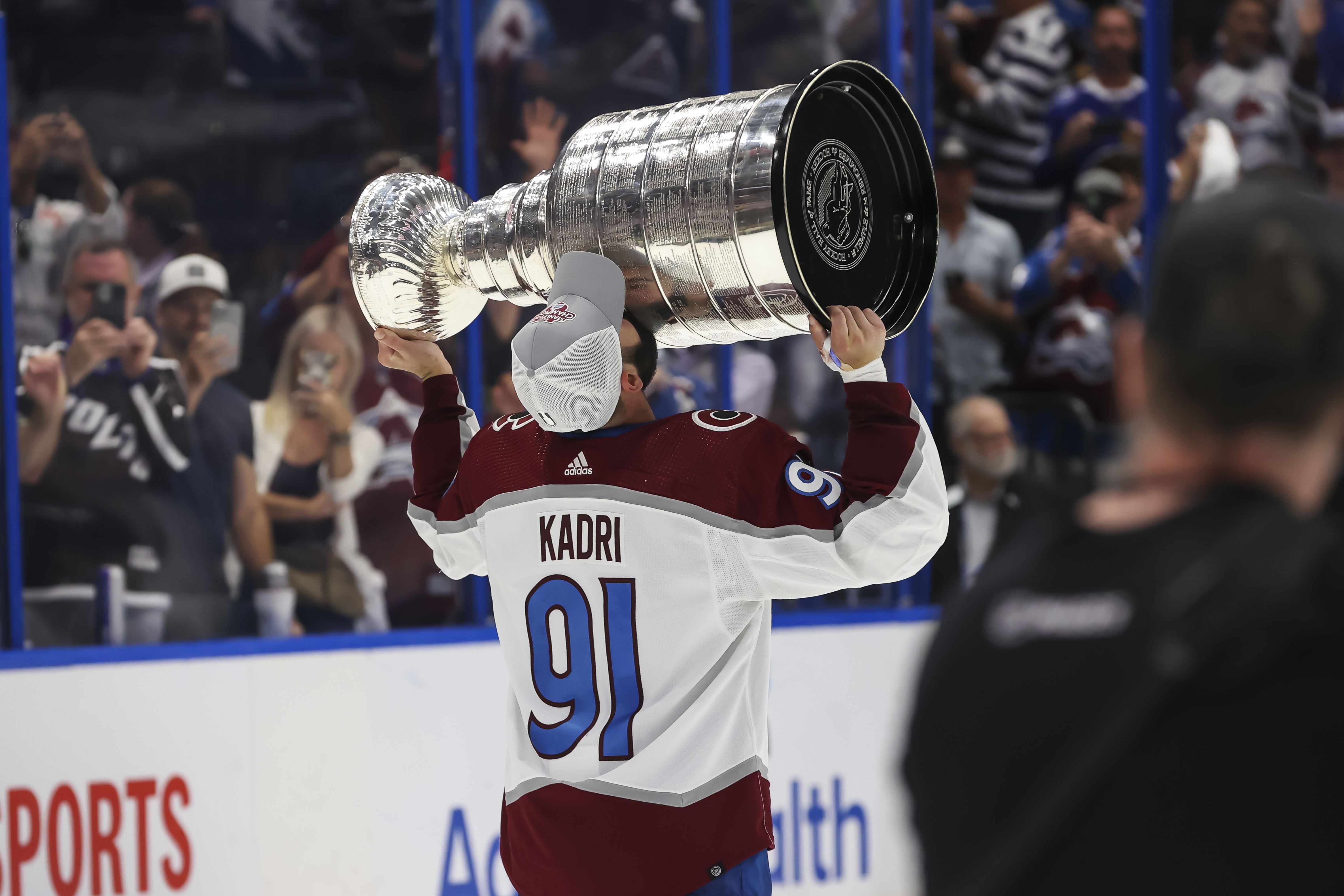 Nazem Kadri #91 and the Colorado Avalanche celebrate winning the Stanley Cup after Game Six.