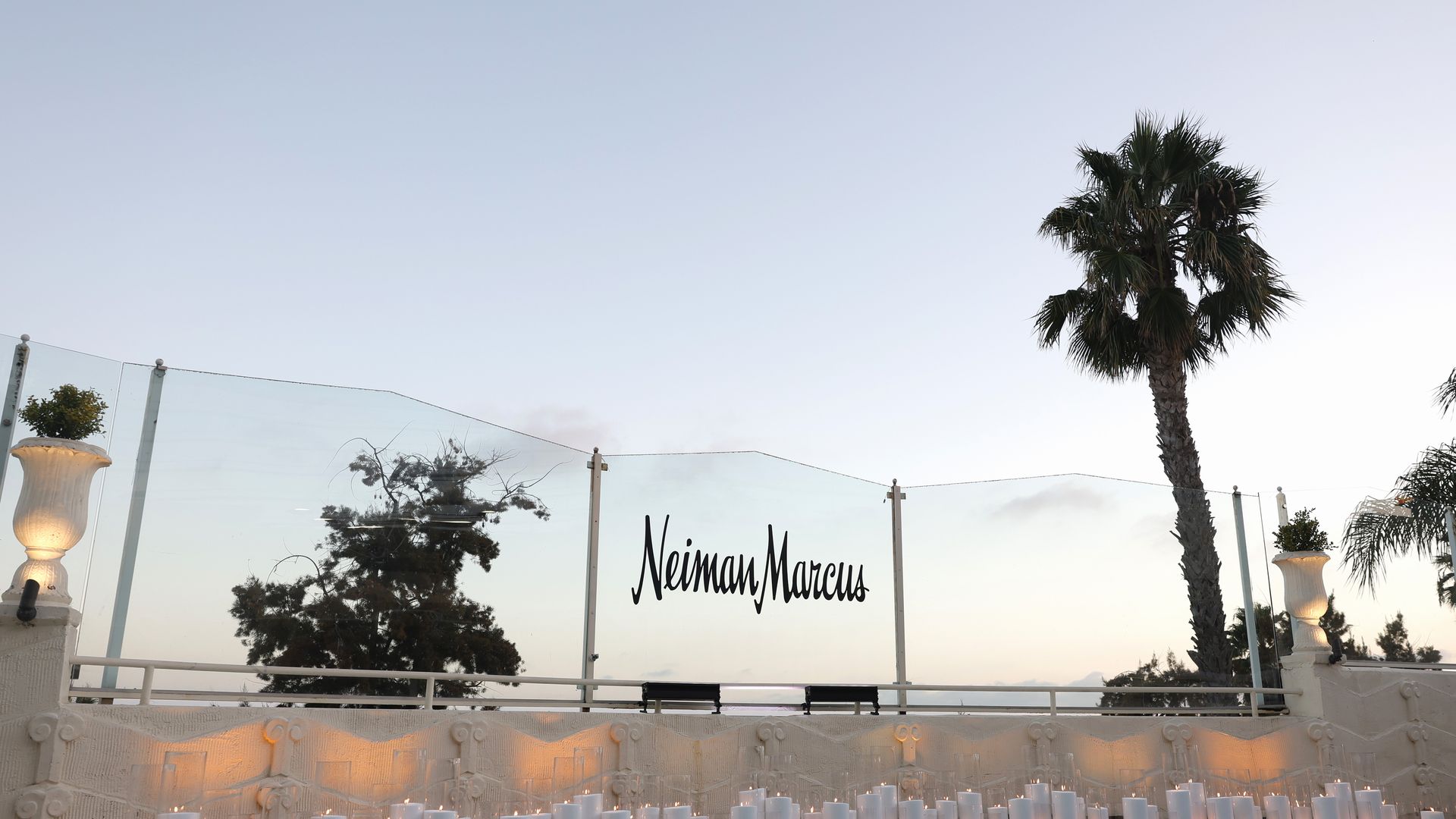 Image of Neiman Marcus logo on a raised outdoor stage