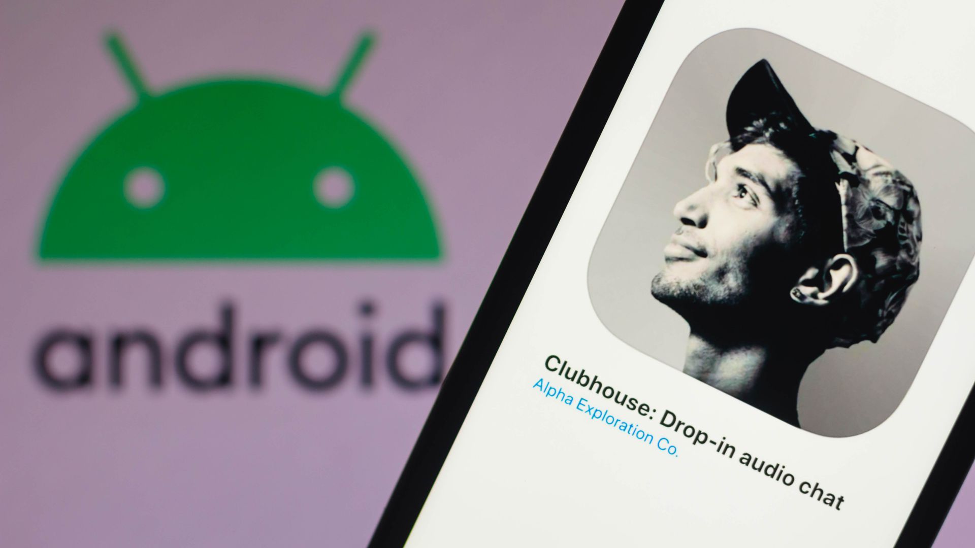 A photo illustration of the Clubhouse app on a smartphone in front of an Android logo background