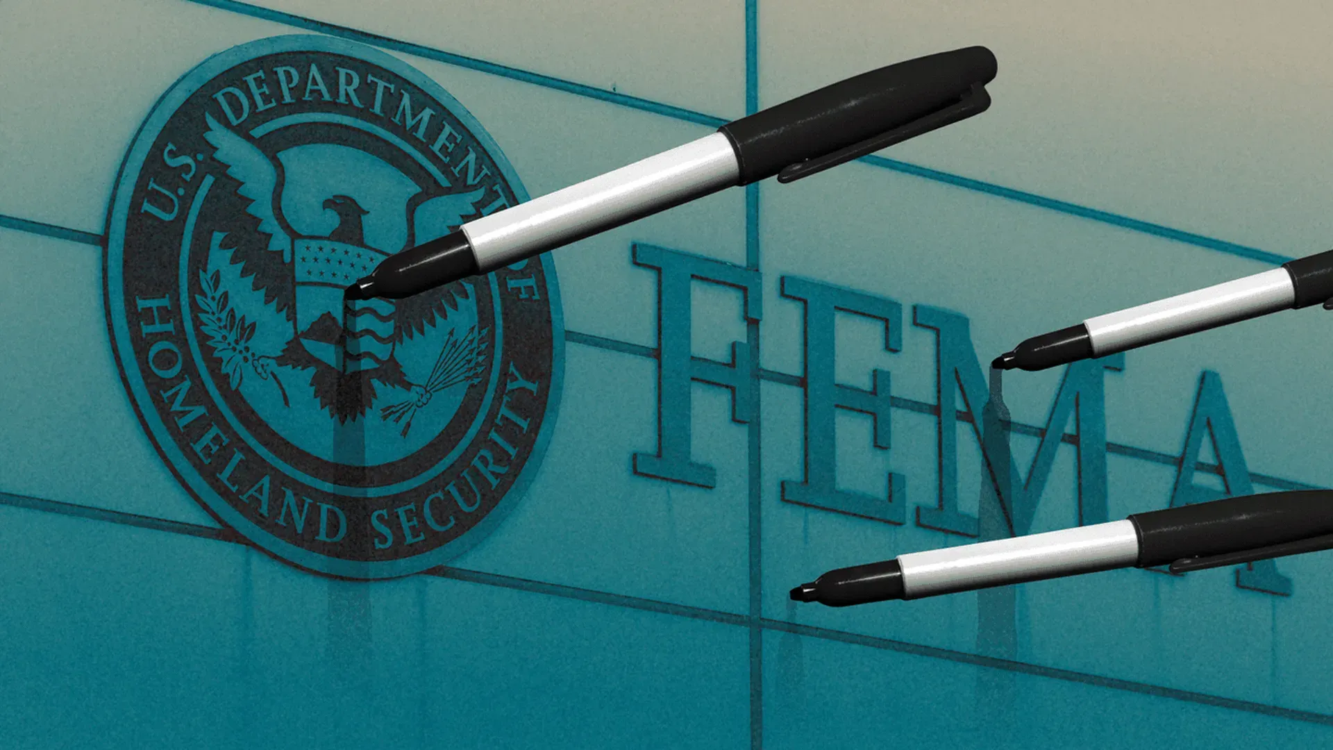 Pens as darts at FEMA logo
