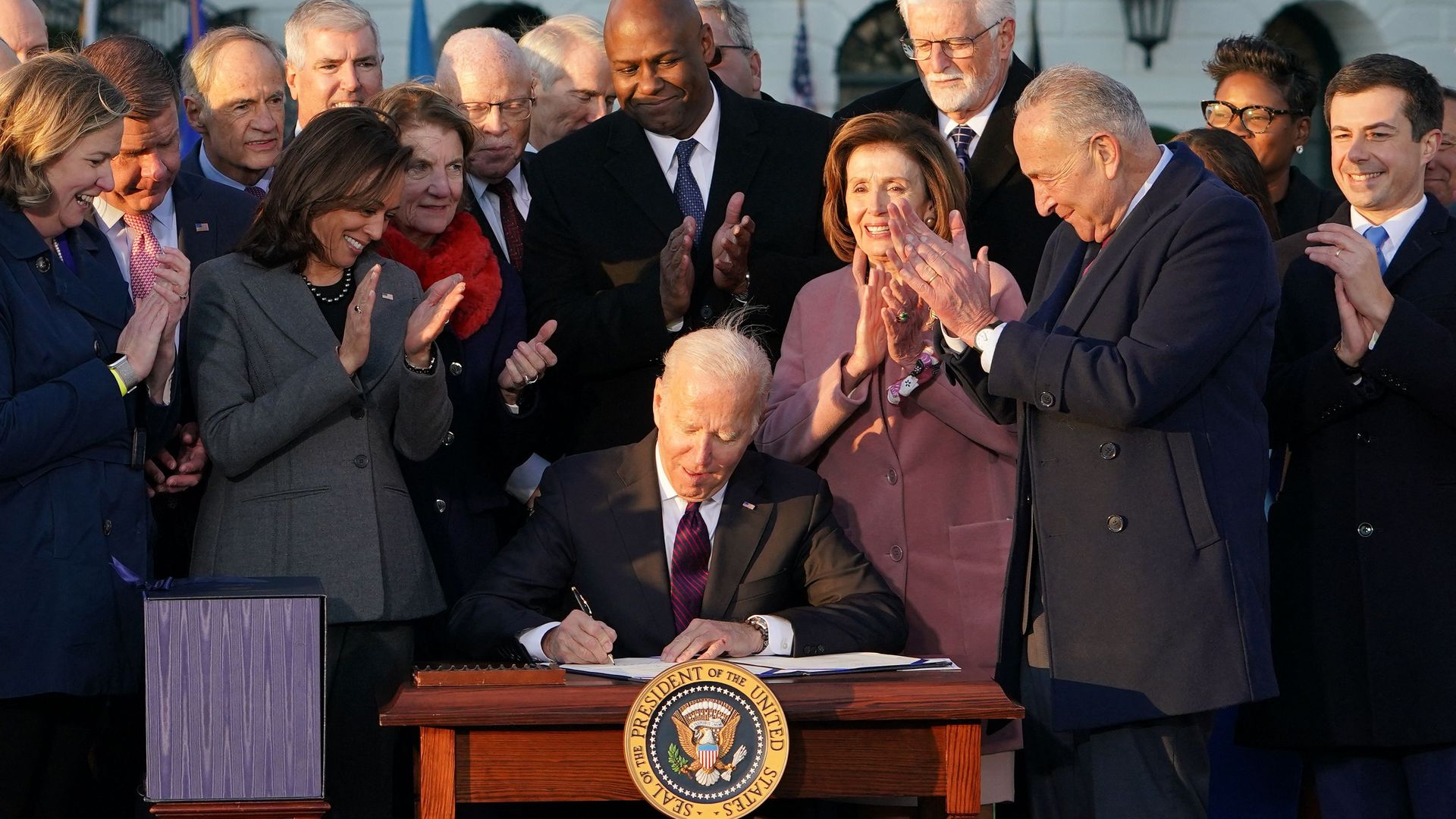 Biden signing the bill 