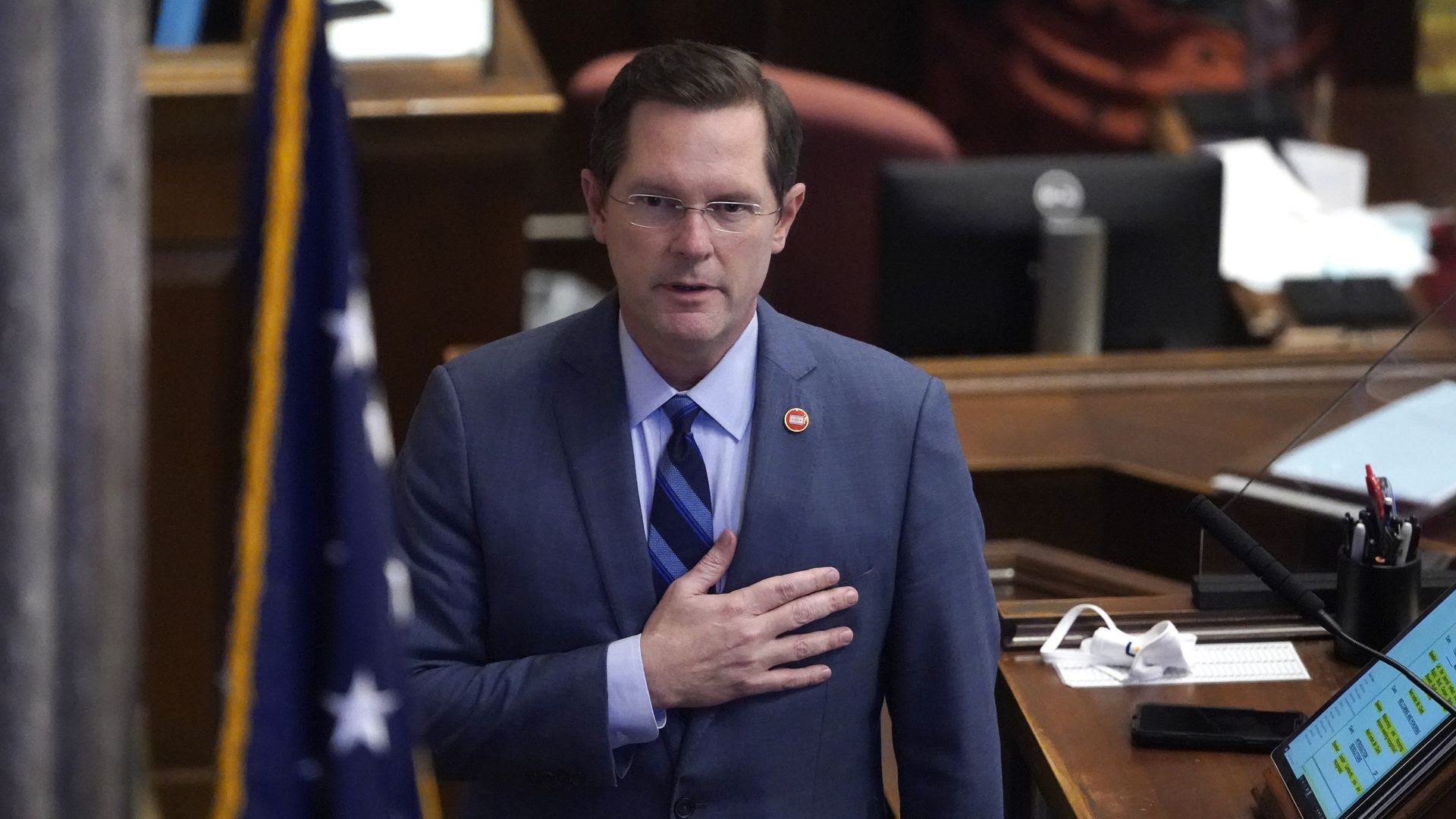 House Speaker Cameron Sexton pledges allegiance or does something else with his hand over his heart.