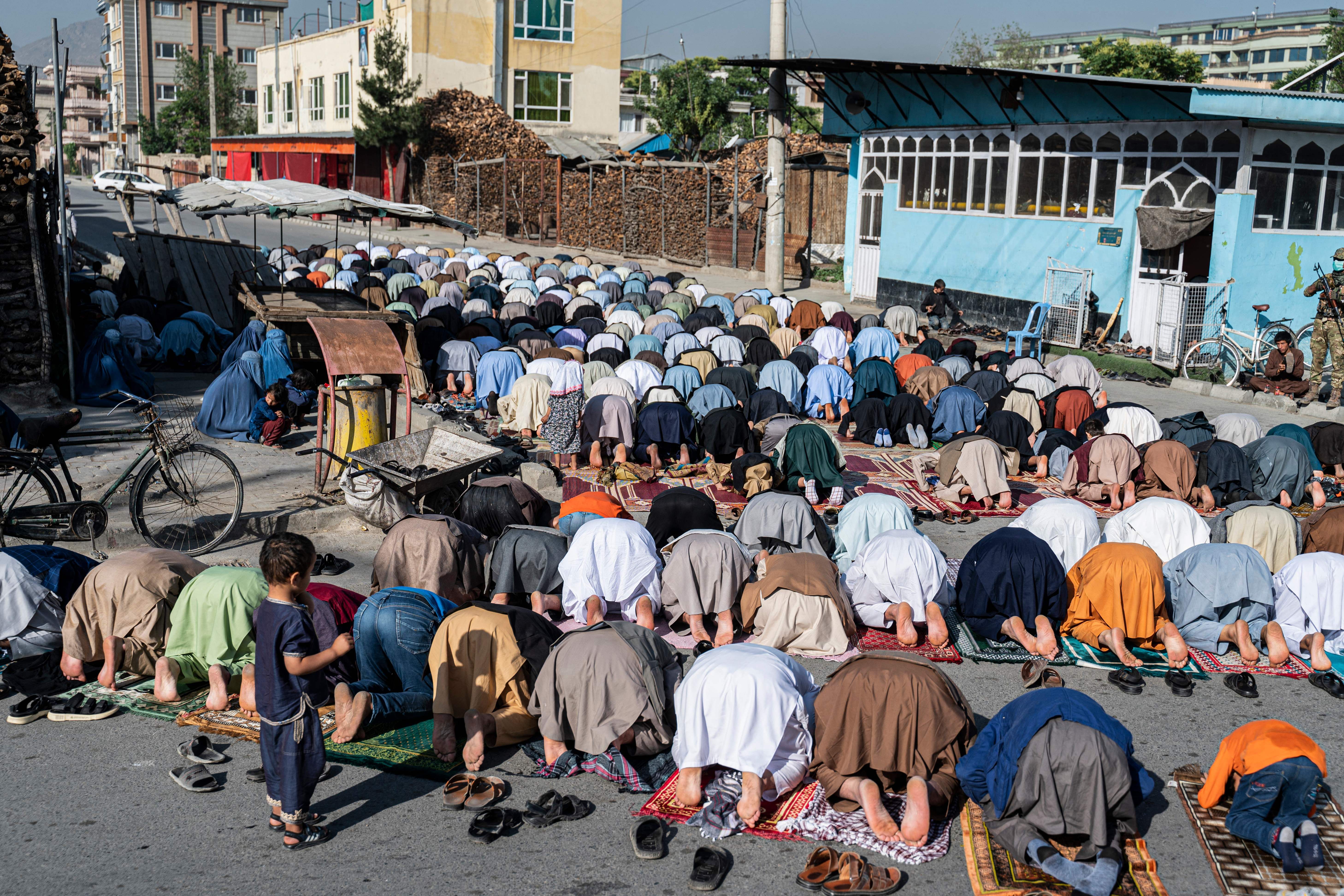 Muslim worshipers in Kabul offer prayers to mark Eid al-Fitr on May 1.