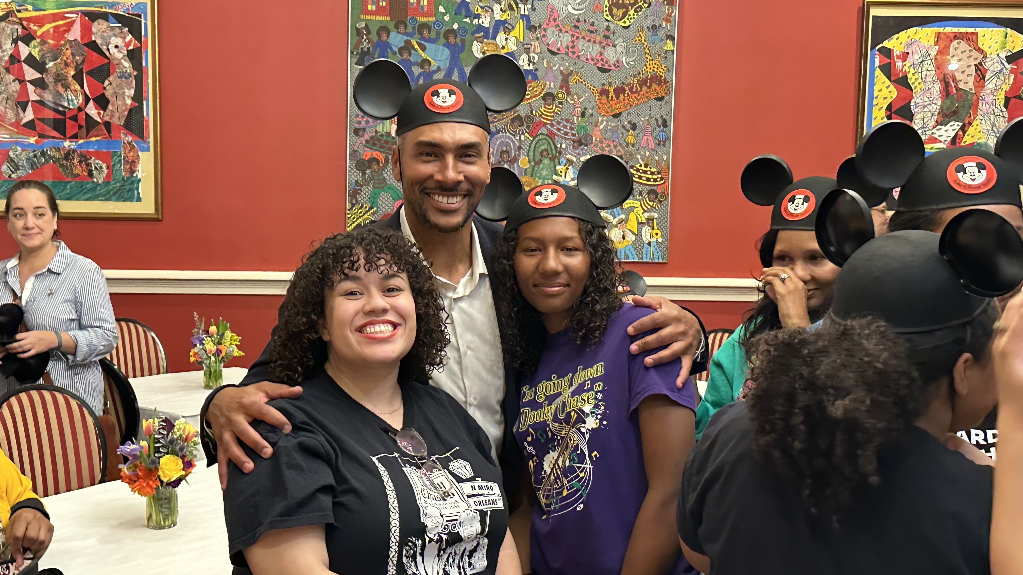 Photo shows Chase family members in Mickey hats.