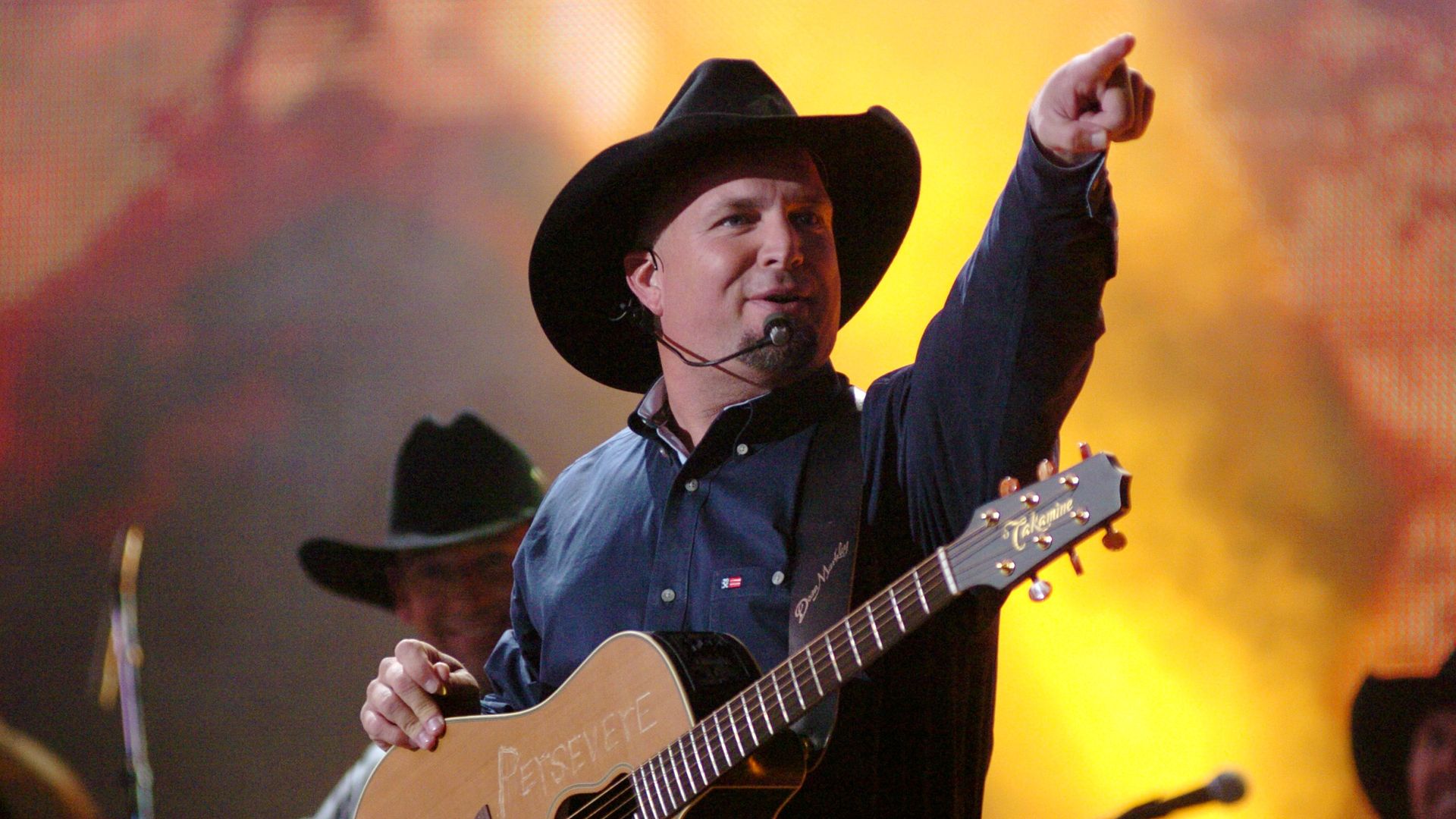 Garth Brooks performing.
