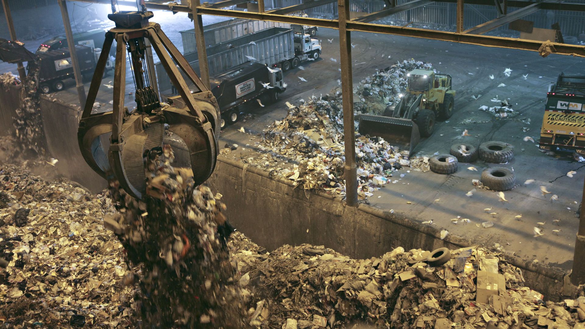 A crane moving trash in a waste-to-energy facility in Pompano Beach, Florida, in March 2009.
